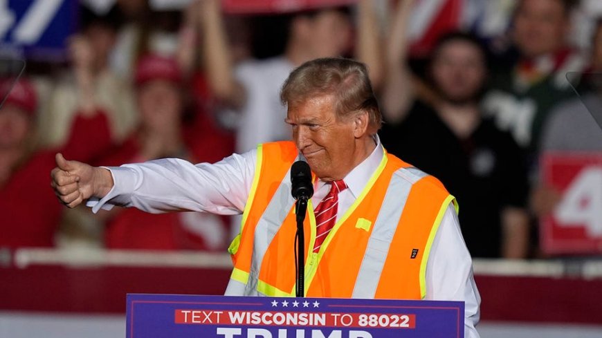 Donald Trump wears garbage worker vest to rally in critical swing state