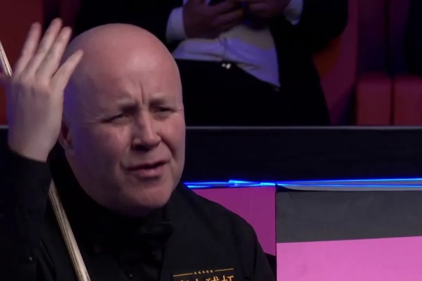 John Higgins storms off in frustration with X-rated outburst as play halted at International Championship