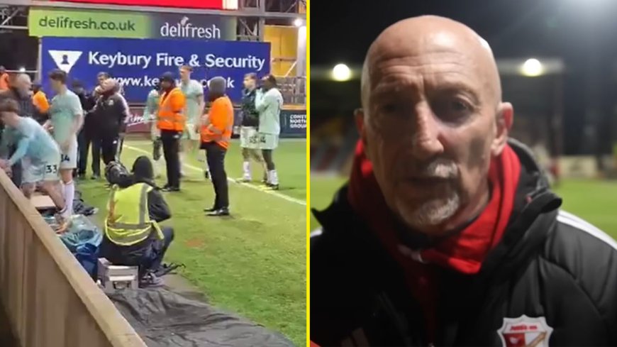 Ian Holloway restrained by his own players after heated argument with Swindon fan