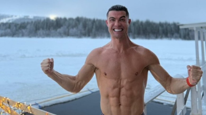 Cristiano Ronaldo strips down to his shorts in the snow in Lapland… but is BANNED from joining in an activity with girlfriend Georgina and their kids