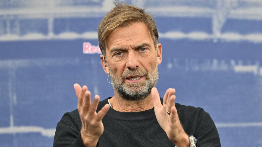 Jurgen Klopp opens up on why he quit 'intense' Liverpool job for first time as he plays the ultimate company man, sipping Red Bull cans at controversial new role unveiling