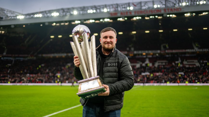 Luke Littler parades World Championship trophy at Old Trafford with darts star serenaded by Manchester United fans