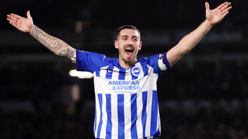 Lewis Dunk pokes fun at fickle Brighton fans with sign about his own manager at darts event