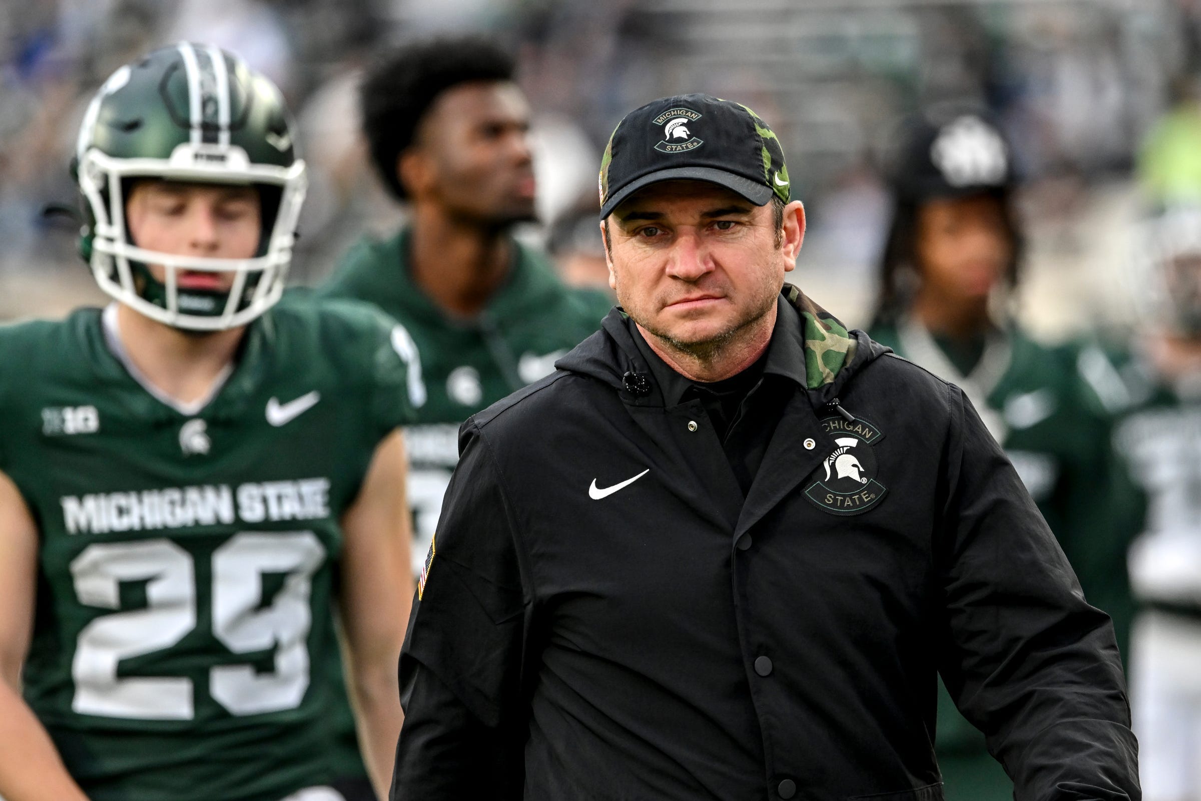 Michigan State's head coach Jonathan Smith walks to the tunnel before the football game against Penn State during the first quarter at Spartan Stadium in East Lansing on Saturday, Nov. 15, 2025.