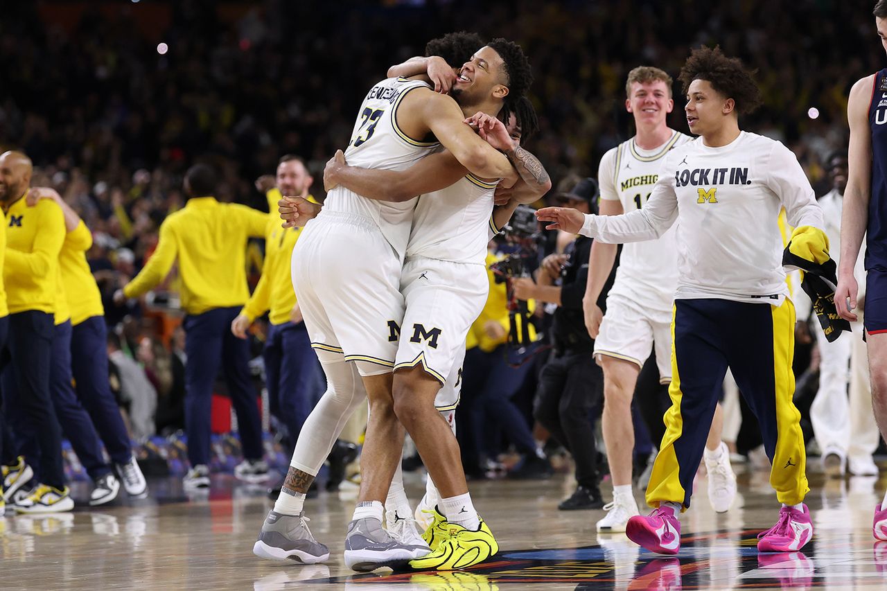 Michigan players celebrates their national championship victory on Monday nightCredit: Michael Reaves/Getty