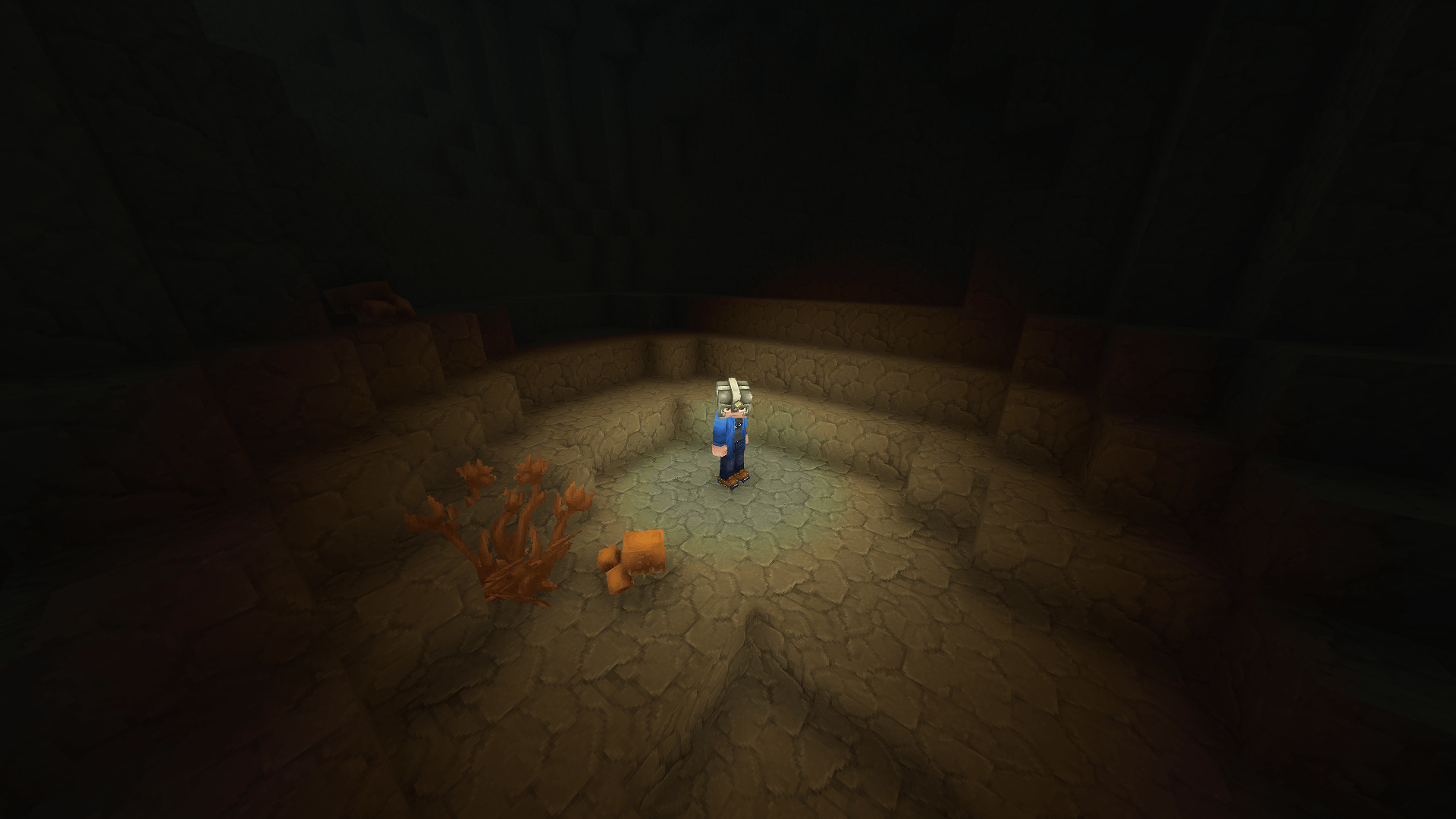 Best Hytale mods: A character with a headlamp in a dark cave for the Miner's Helmet mod.