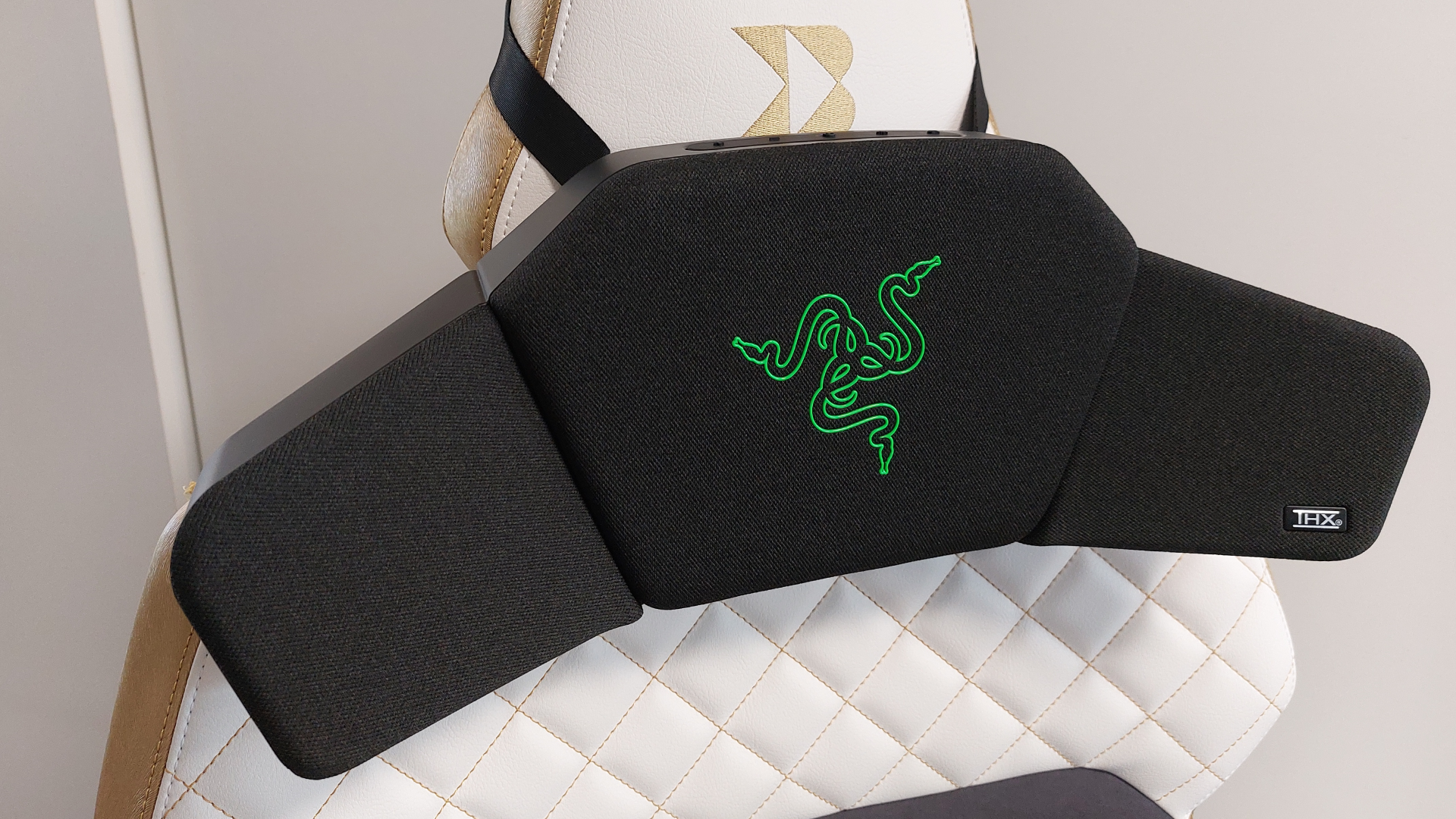 The Razer Clio headrest speaker mounted to a Backforce chair.