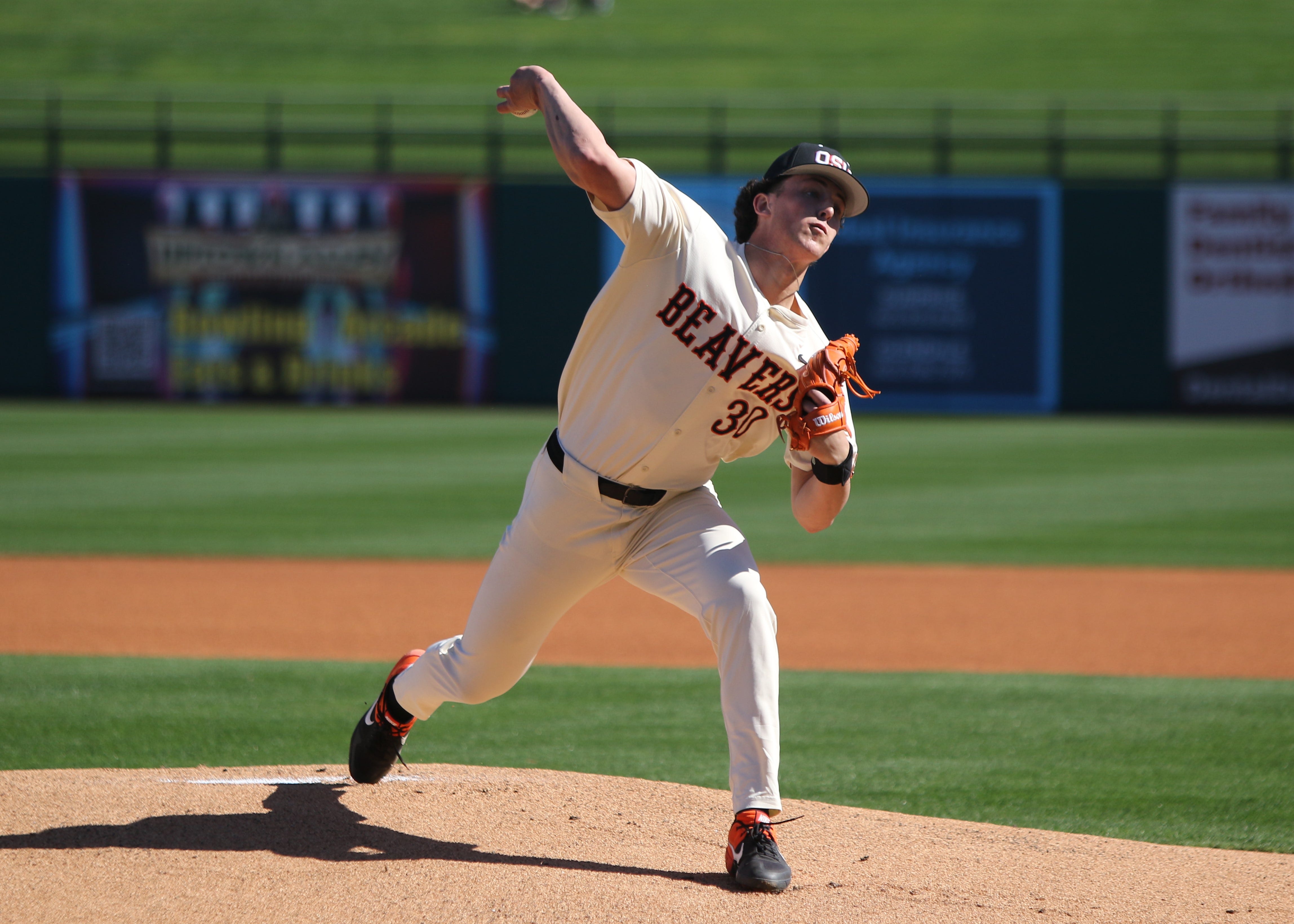 Oregon State pitcher Dax Whitney pitches during the Beavers' 16-0 win over UNLV in Scottsdale, Arizona on Feb. 15, 2025.