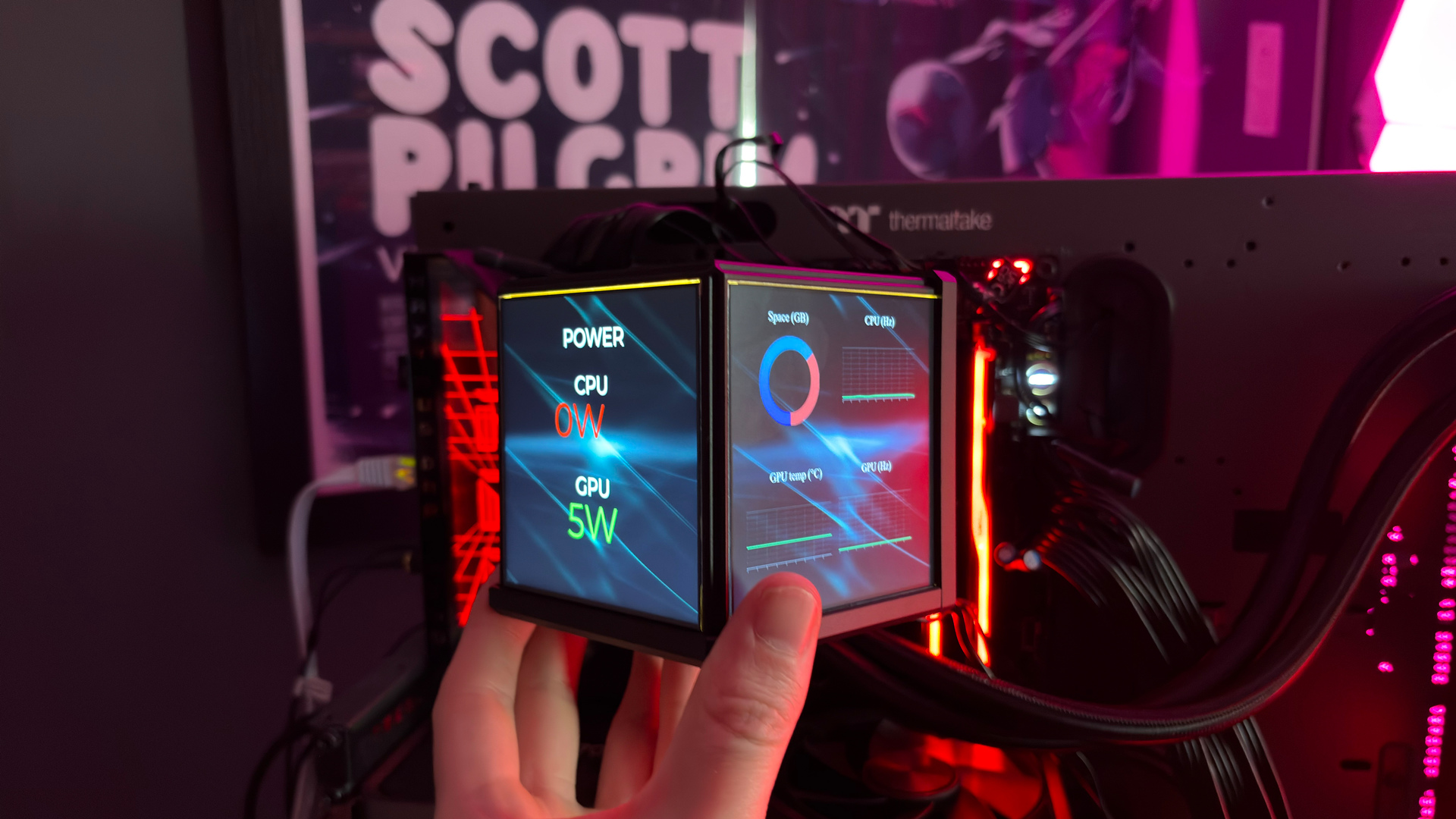 The Thermaltake Minecube 360 Ultra ARGB Sync set up on an open test bench.