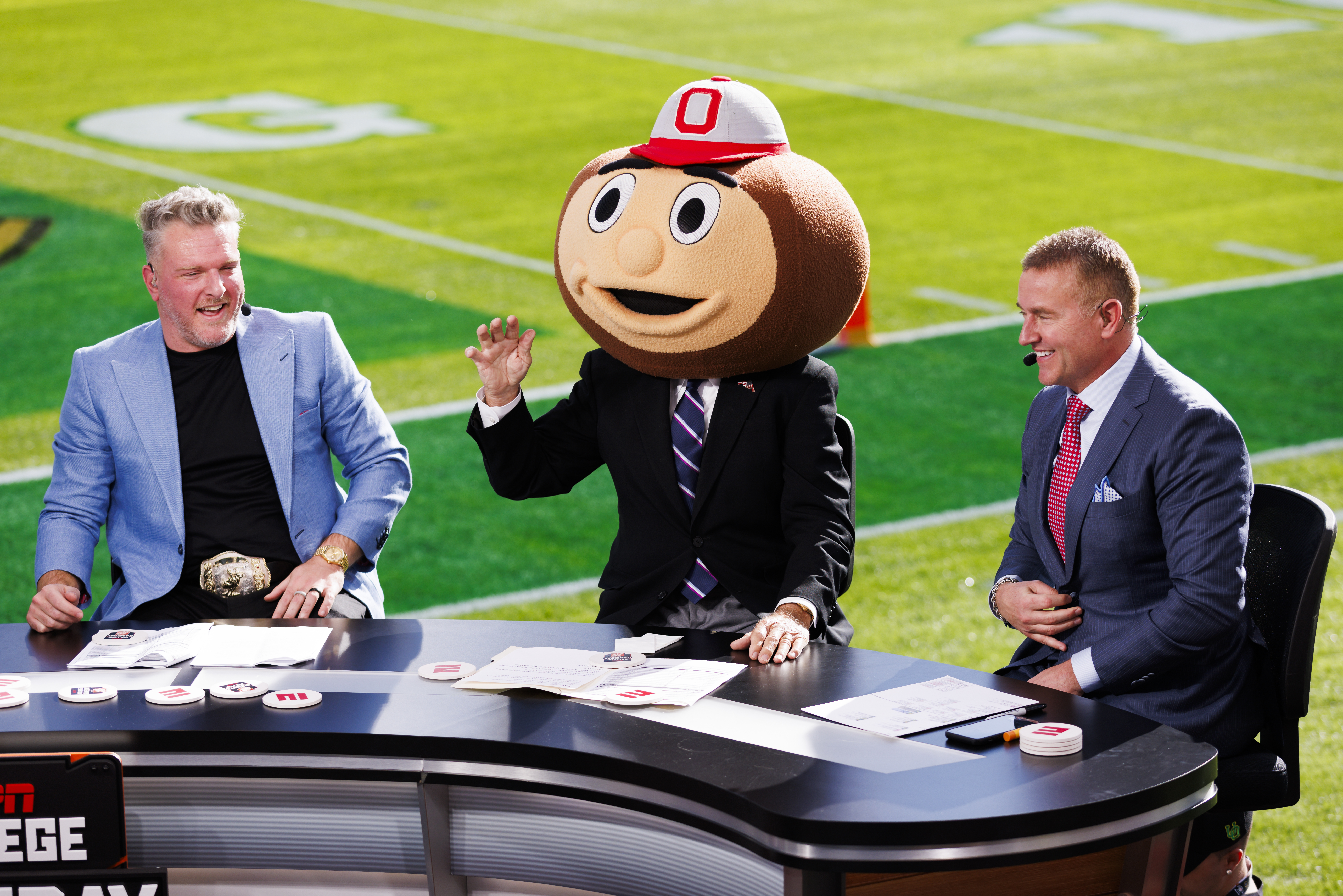 PASADENA, CALIFORNIA - JANUARY 1: Lee Corso of ESPN College GameDay wears a Ohio State Buckeyes mascot head with Pat McAfee and Kirk Herbstreit as they appear on set before the Rose Bowl between Ohio State Buckeyes and Oregon Ducks at Rose Bowl Stadium on January 1, 2025 in Pasadena, California. (Photo by Ric Tapia/Getty Images)