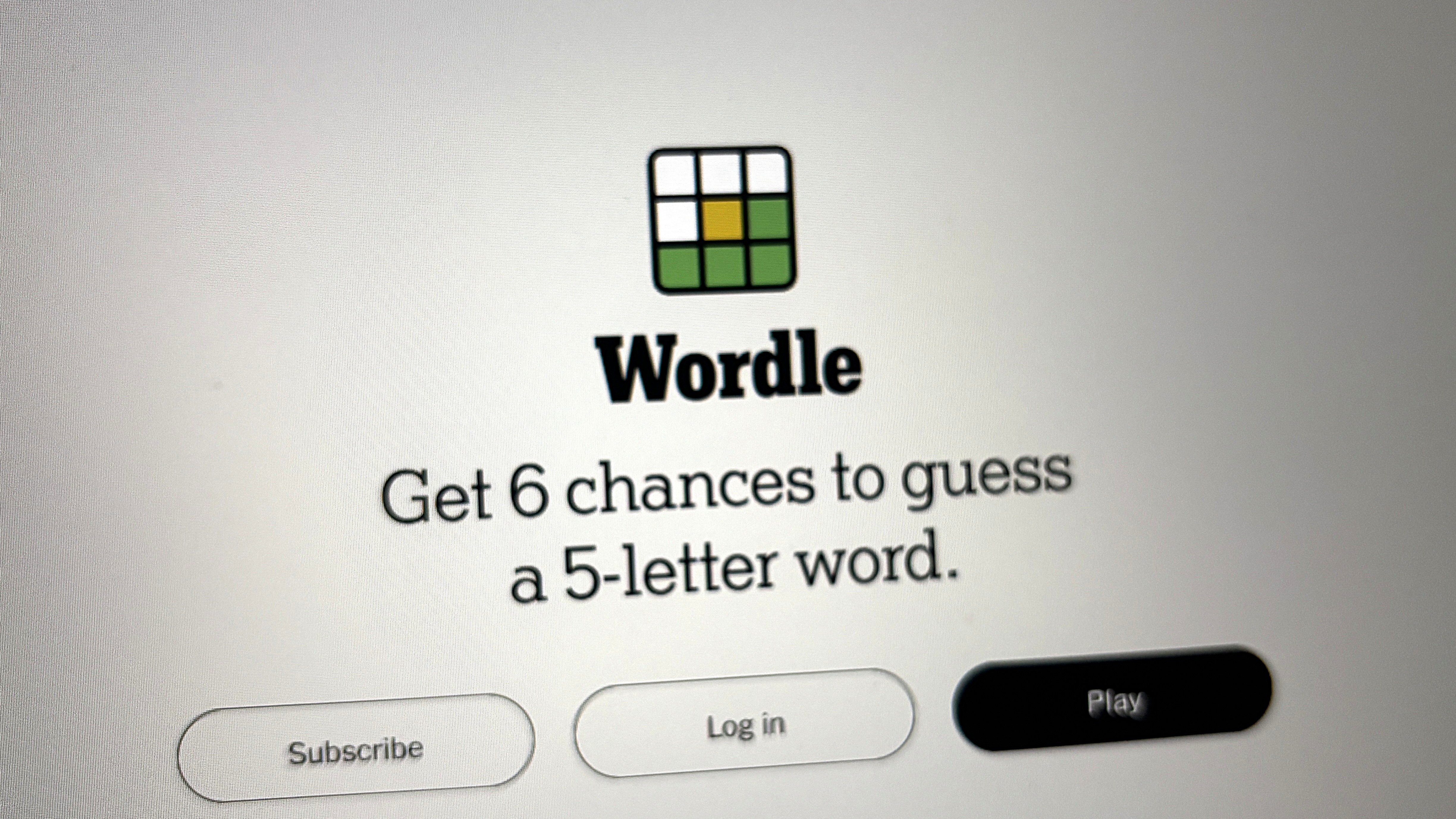 A photo of a screen displaying Wordle