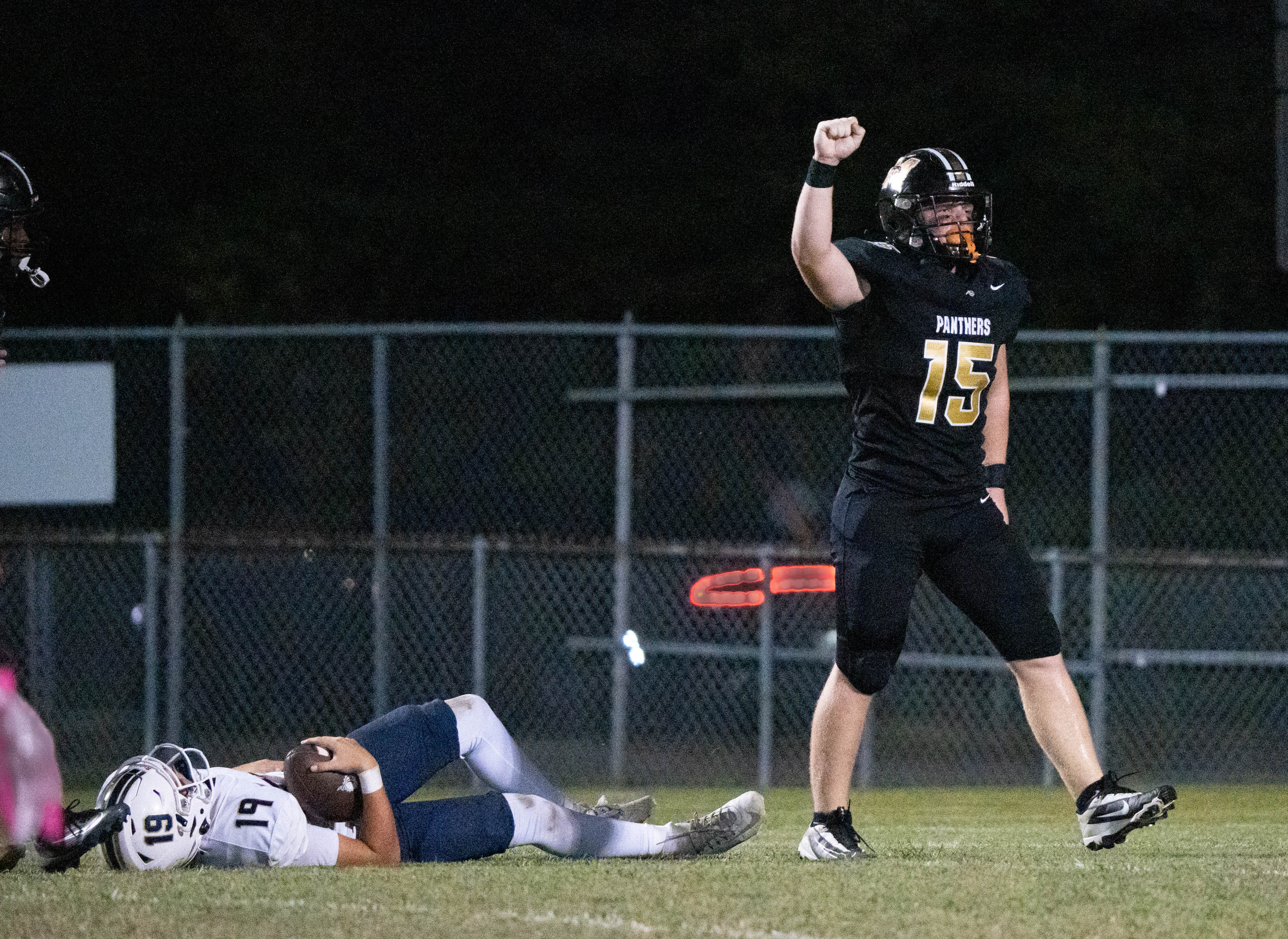 Panthers Aiden Spratt (15) celebrates a sack during the Gulf Breeze vs Milton football game at Milton High School on Oct. 9, 2025.
