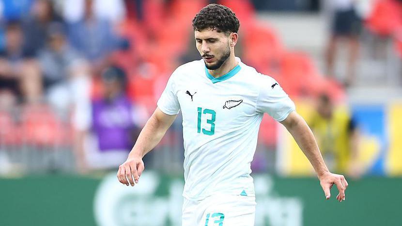 Liberato Cacace in action for New Zealand against Ukraine