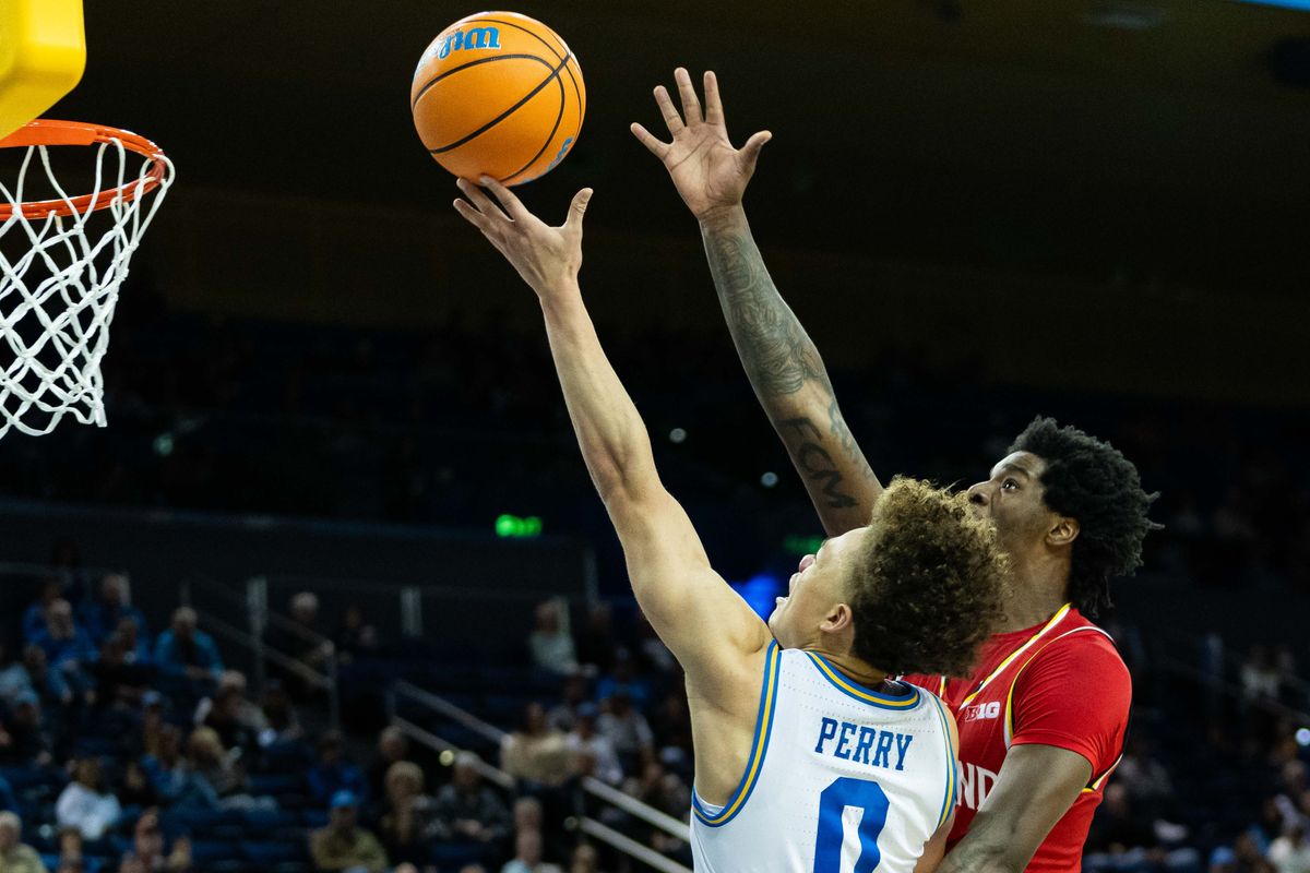 UCLA guard Trent Perry (0) driving into the lane during a Big 10 basketball game against Maryland, Saturday , January 10th, 2025 in Los Angeles, California