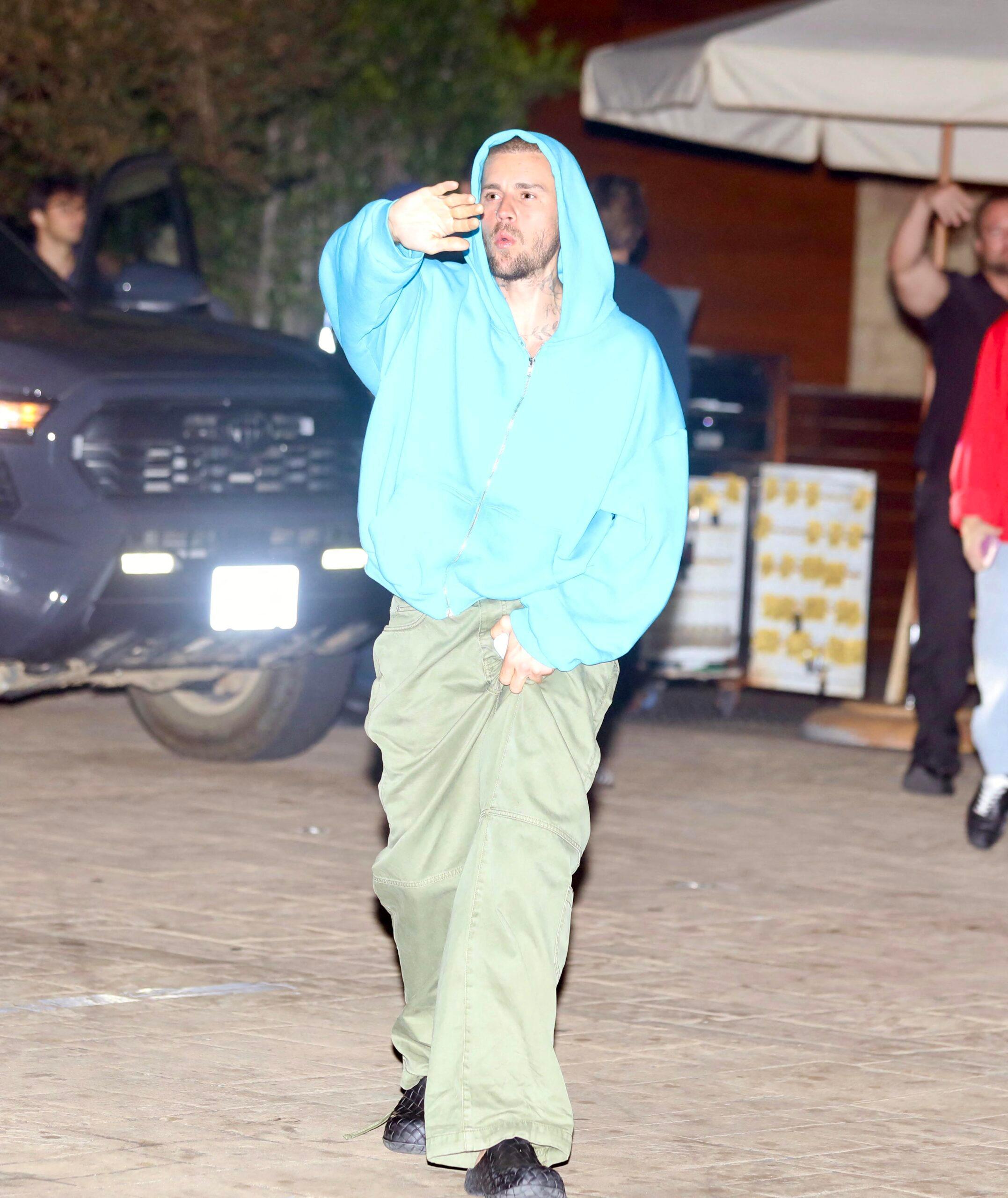 Justin Bieber gets into a heated conversation with photographers outside of Nobu in Malibu