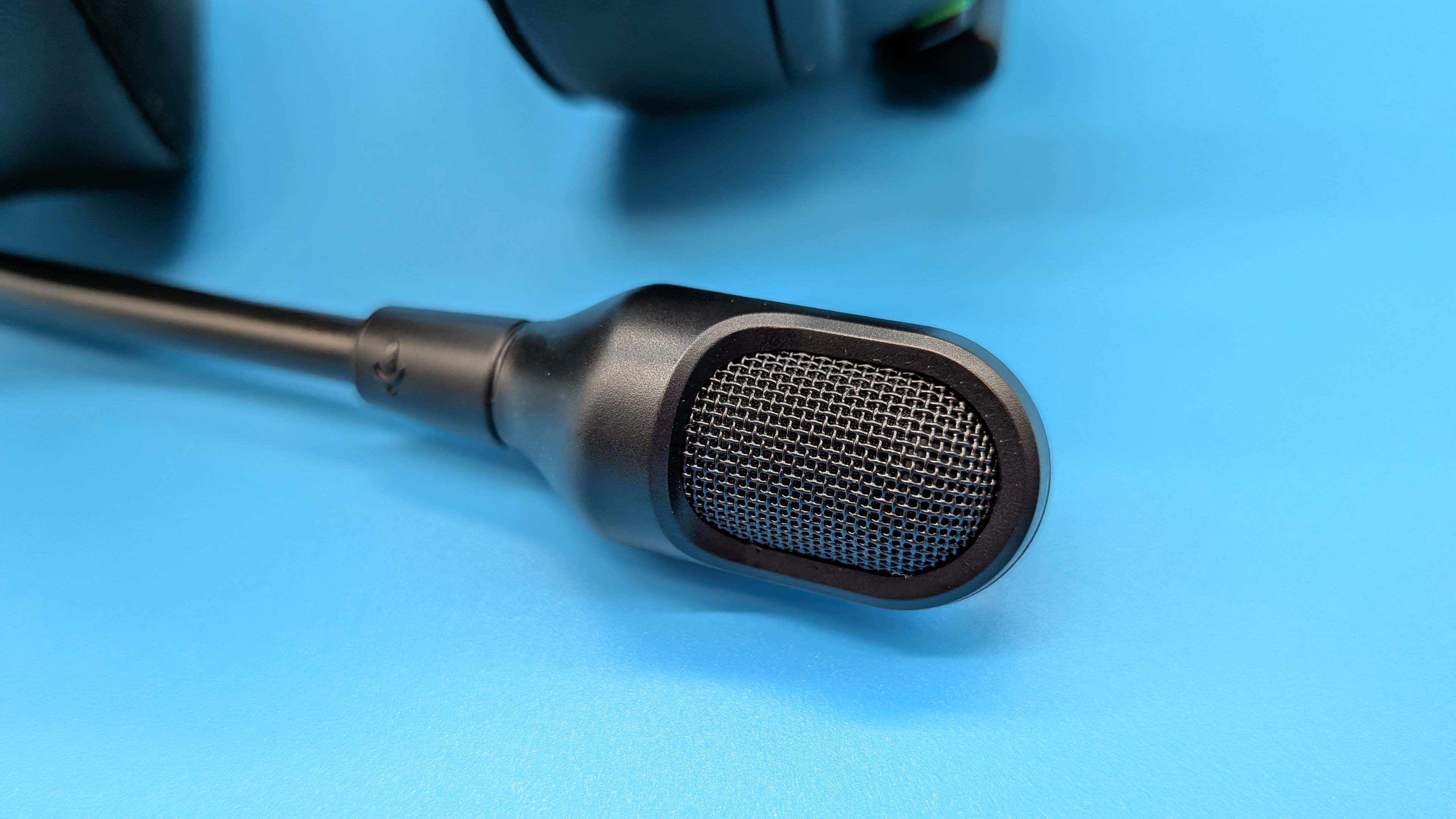 Razer BlackShark V3 gaming headset on a blue blackground