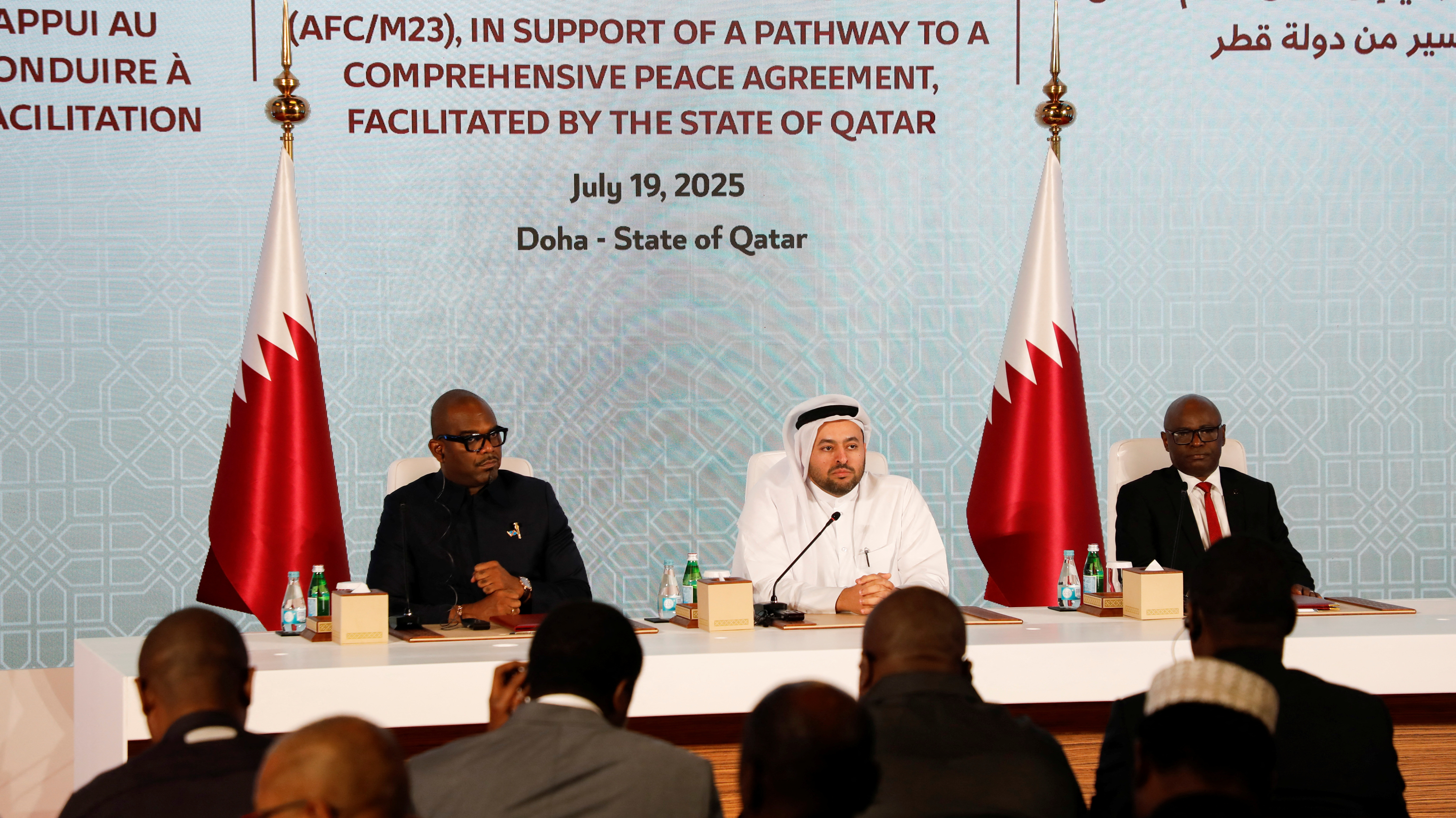 Congo's President Felix Tshisekedi's high representative Sumbu Sita Mambu, Qatar's Minister of State for Foreign Affairs, Mohammed bin Abdulaziz Al-Khulaifi and Benjamin Mbonimpa, who heads the M23 delegation to Doha attend a signing ceremony of a declaration of principles to end fighting in eastern Congo between the Democratic Republic of Congo and the M23 rebel group, in Doha, Qatar, July 19, 2025. REUTERS/Imad Creidi