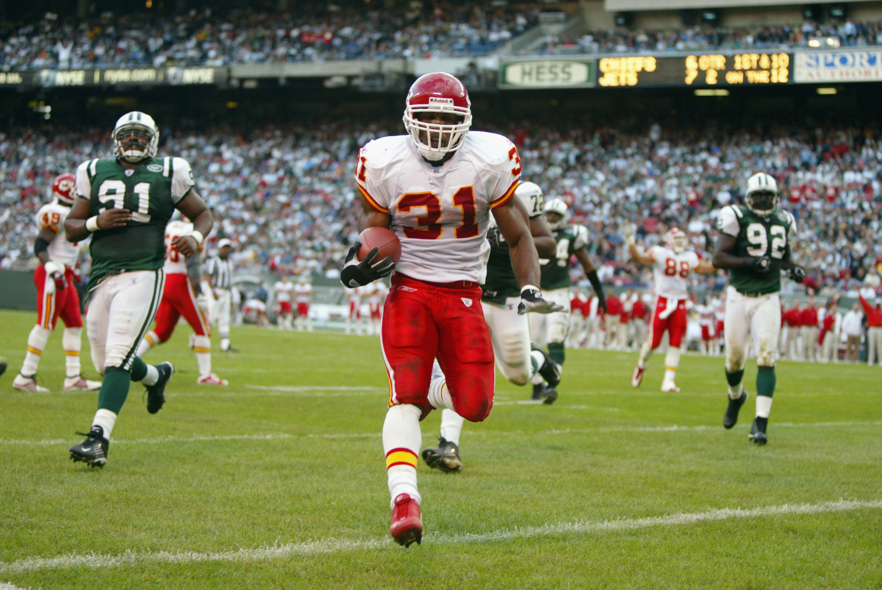 EAST RUTHERFORD, NJ - OCTOBER 6: Running back Priest Holmes #31 of the Kansas City Chiefs carries the ball during the game against the New York Jets on October 6, 2002 at Giants Stadium in East Rutherford, New Jersey. The Cheifs won 38-13. (Photo by Al Bello/Getty Images)