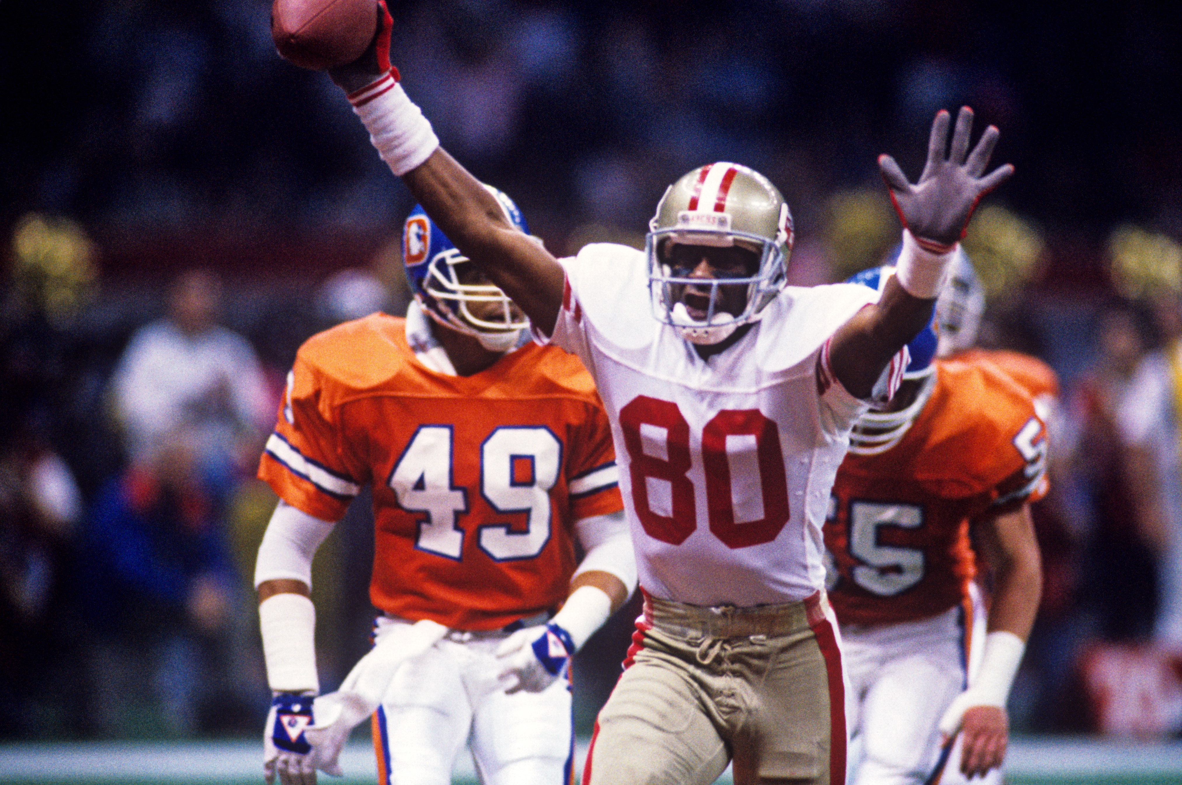 NEW ORLEANS, LA - JANUARY 28: Wide receiver Jerry Rice #80 of the San Francisco 49ers celebrates a 38-yard touchdown in the second quarter of Super Bowl XXIV against the Denver Broncos on January 28, 1990 at the Louisiana Superdome in New Orleans, Louisiana. San Francisco won 55-10. (Photo by Rich Pilling/Diamond Images via Getty Images)