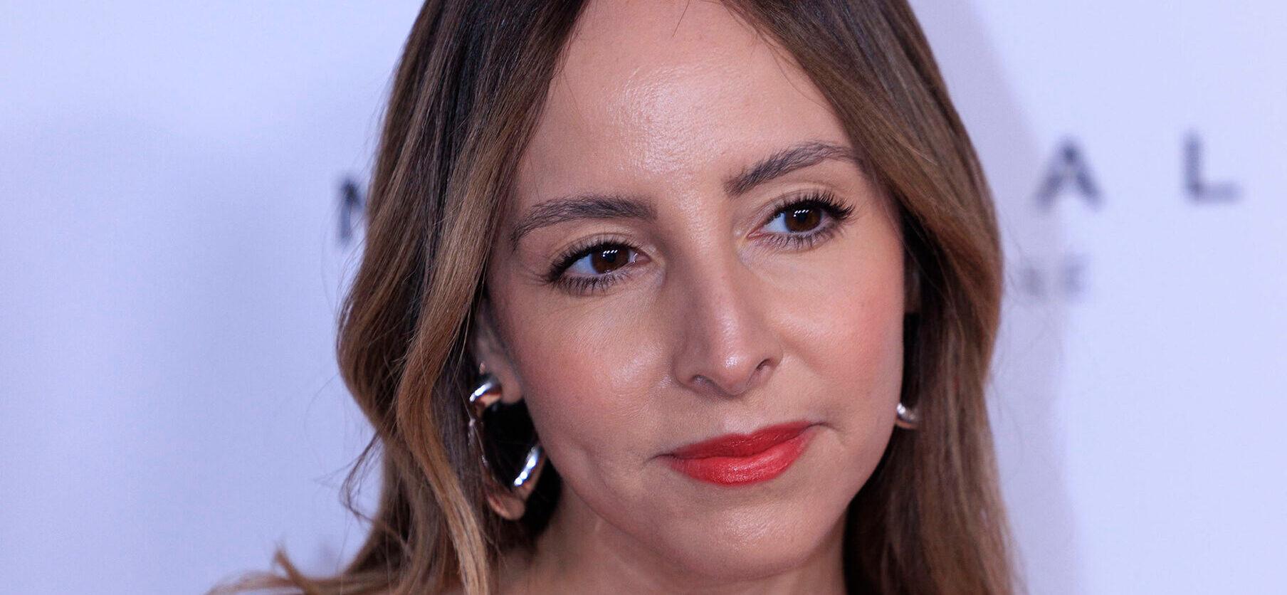 Lilliana Vazquez posing on the red carpet.