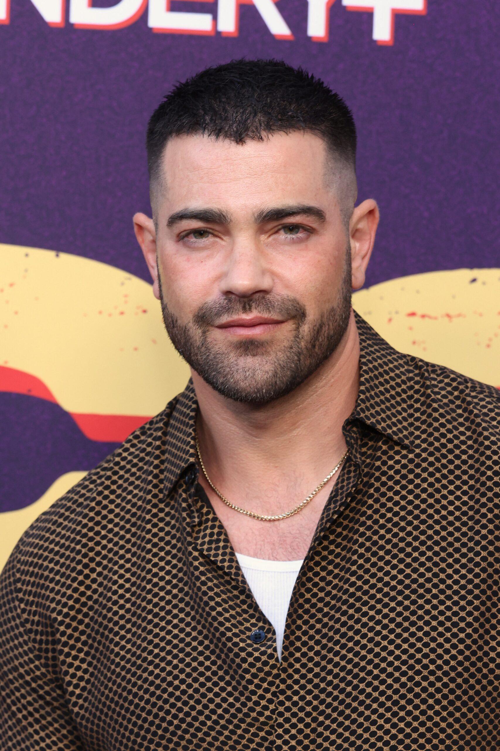 Jesse Metcalfe posing on the red carpet. 