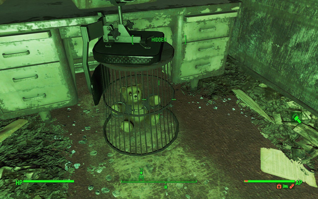 Fallout 4 bear wearing handcuffs under waste bin with chair holding it down.