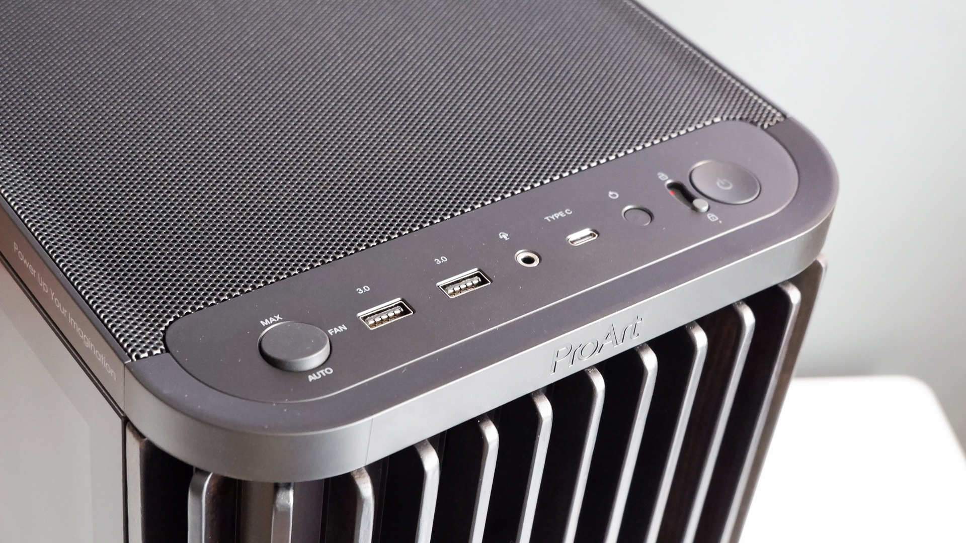 A gaming PC in the process of being built, using Radeon and Ryzen components and an Asus Pro Art PA401 PC case.