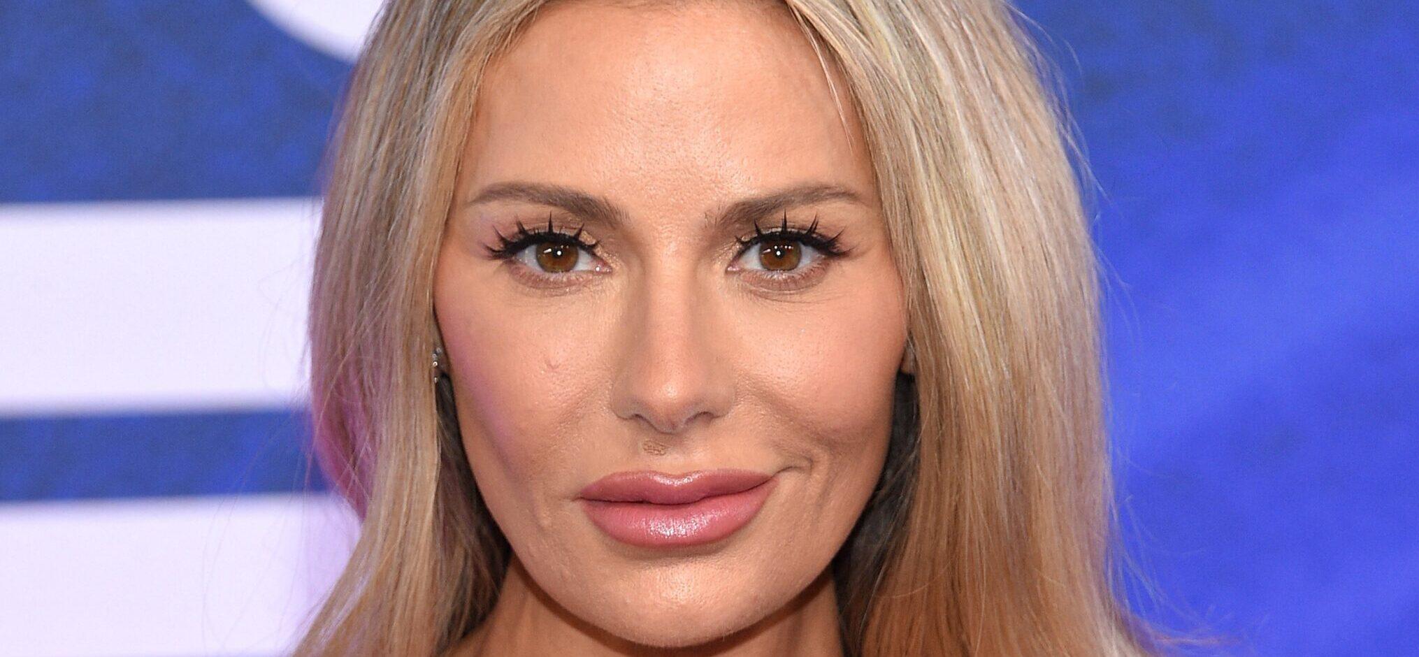 Dorit Kemsley posing on the red carpet.