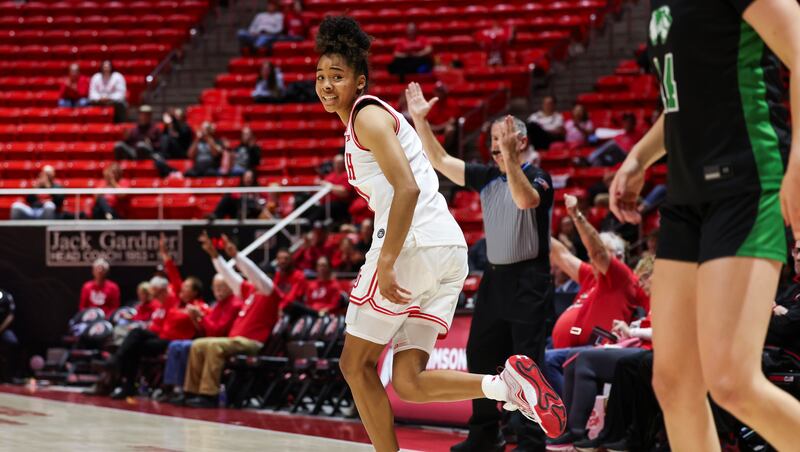 Utah guard Lani White reacts after hitting a shot during the Utes' 75-52 win over Utah Valley at the Huntsman Center in Salt Lake City on Tuesday, Nov. 11, 2025.