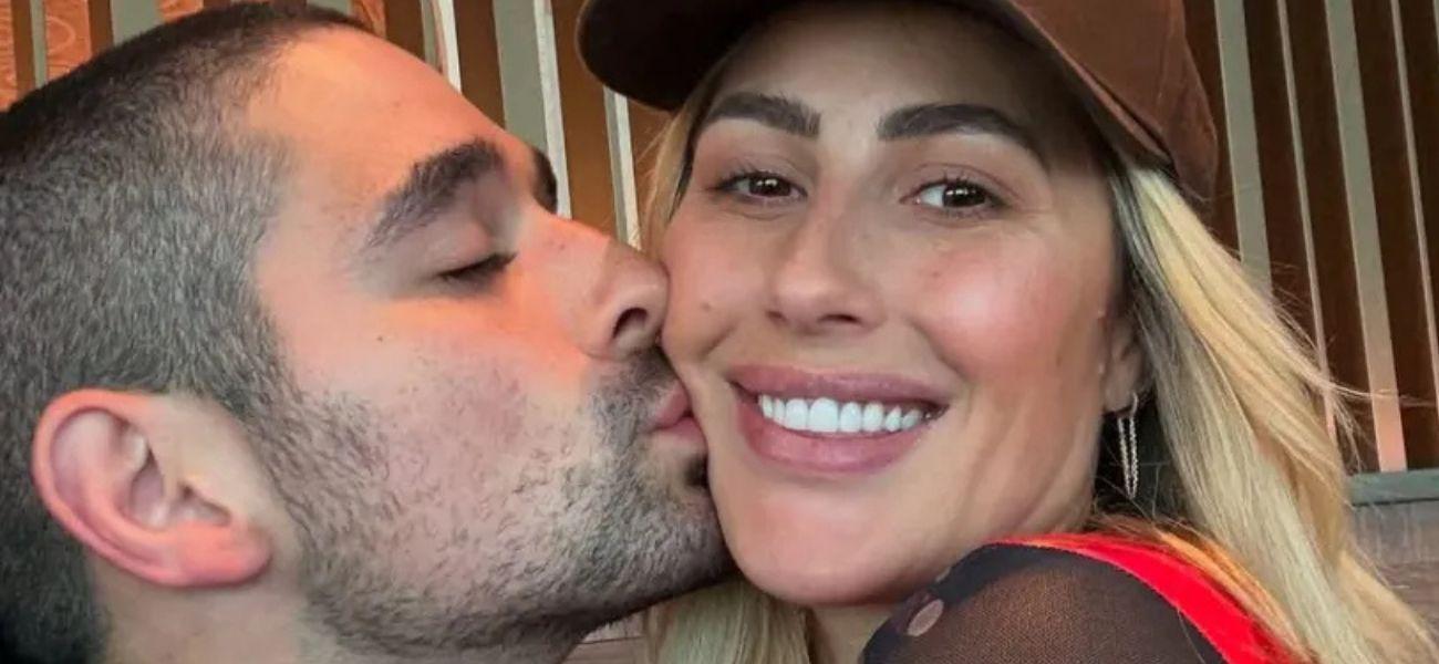 Alan Bersten kisses Emma Slater on the cheek