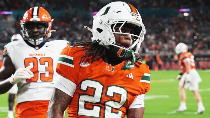 Miami running back Girard Pringle Jr. (22) celebrates after scoring a touchdown during his team's 38-10 romp of Syracuse on Nov. 8. ©Marta Lavandier