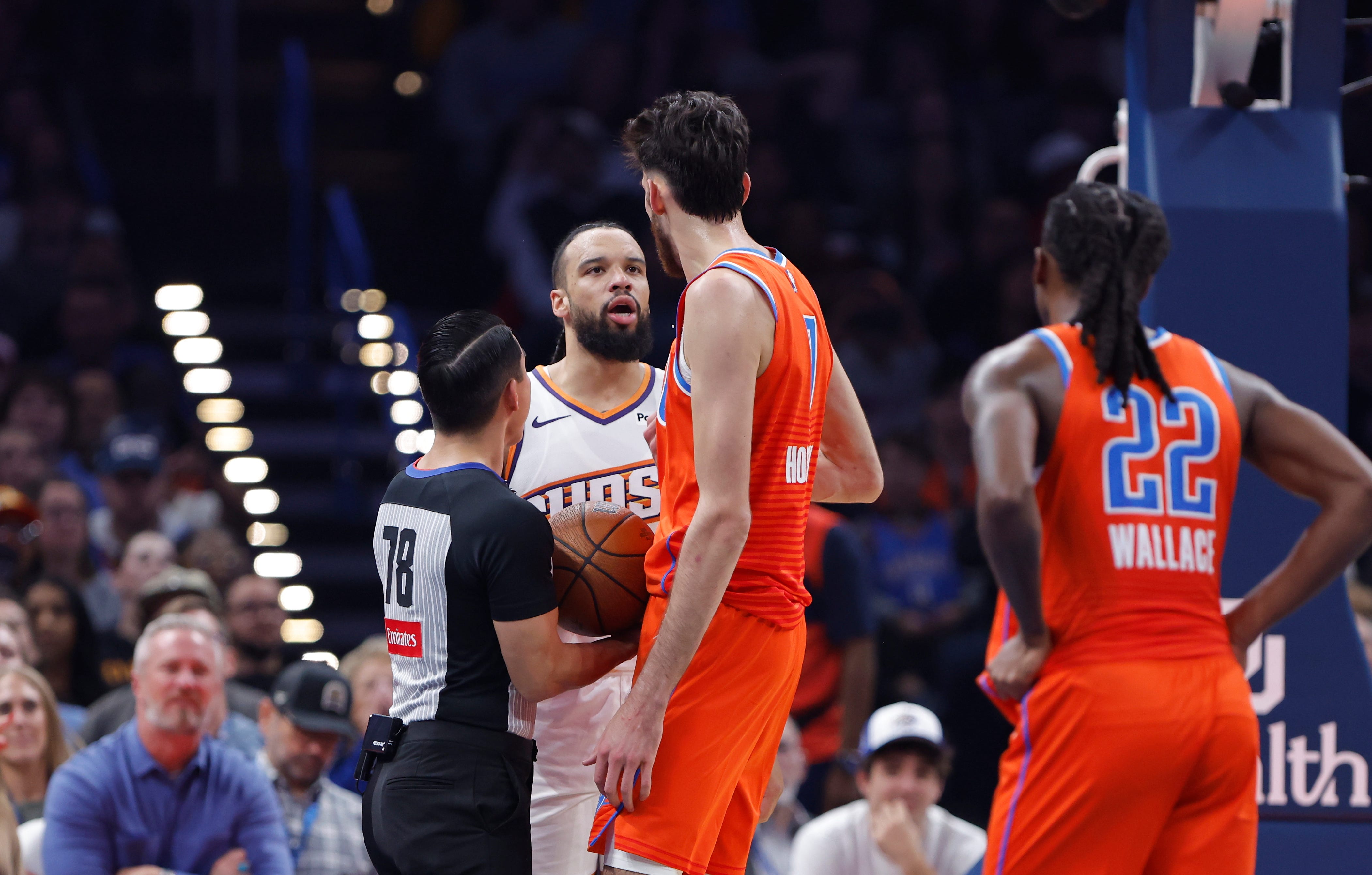 Nov 28, 2025; Oklahoma City, Oklahoma, USA; Phoenix Suns forward Dillon Brooks (3) and Oklahoma City Thunder center Chet Holmgren (7) exchange words during the second quarter at Paycom Center. Mandatory Credit: Alonzo Adams-Imagn Images