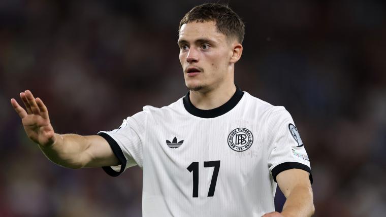 Florian Wirtz gestures during a Germany match