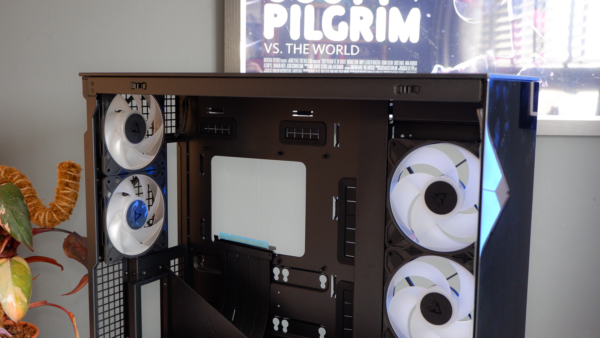 Arctic's Xtender PC case on a white desk with various parts being installed to build a functional gaming PC.