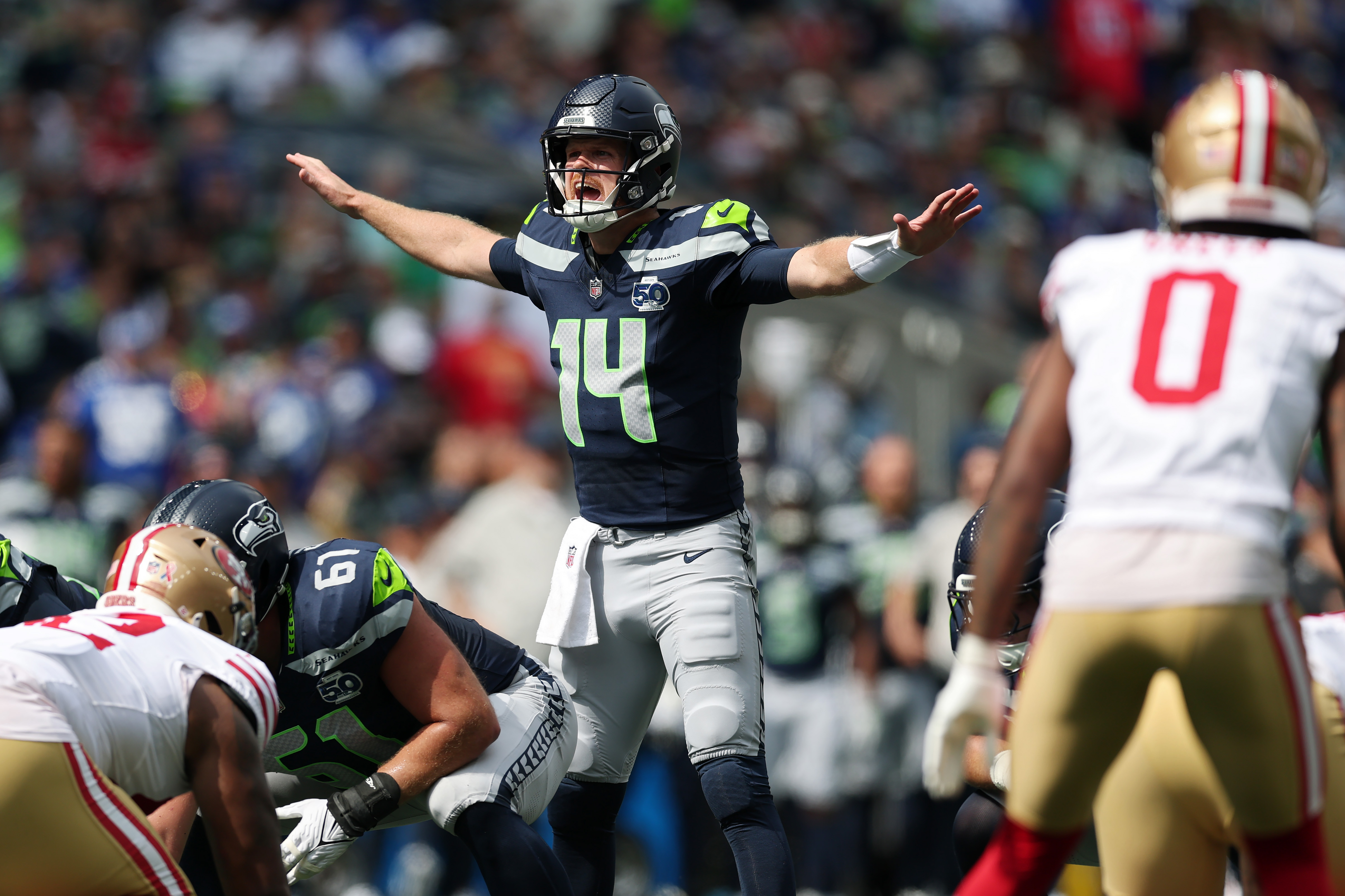 SEATTLE, WASHINGTON - DECEMBER 22: Sam Darnold #14 of the Minnesota Vikings passes Seahawks at Lumen Field on December 22, 2024 in Seattle, Washington. (Photo by Steph Chambers/Getty Images)