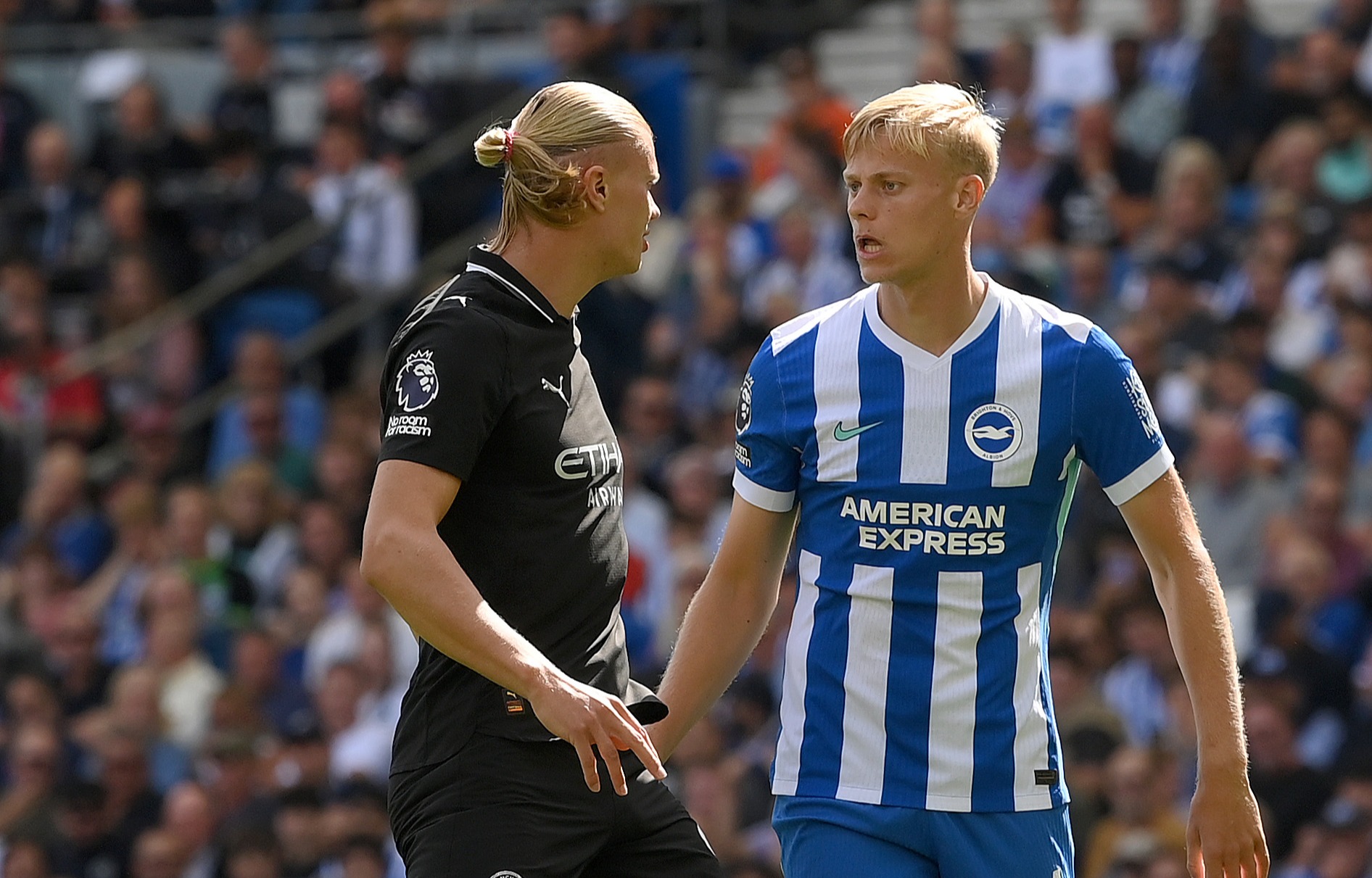 BRIGHTON, ENGLAND - AUGUST 31: Erling Haaland of Manchester City clashes with Jan Paul van Hecke of Brighton & Hove Albion during the Premier League match between Brighton & Hove Albion and Manchester City at Amex Stadium on August 31, 2025 in Brighton, England. (Photo by Mike Hewitt/Getty Images)