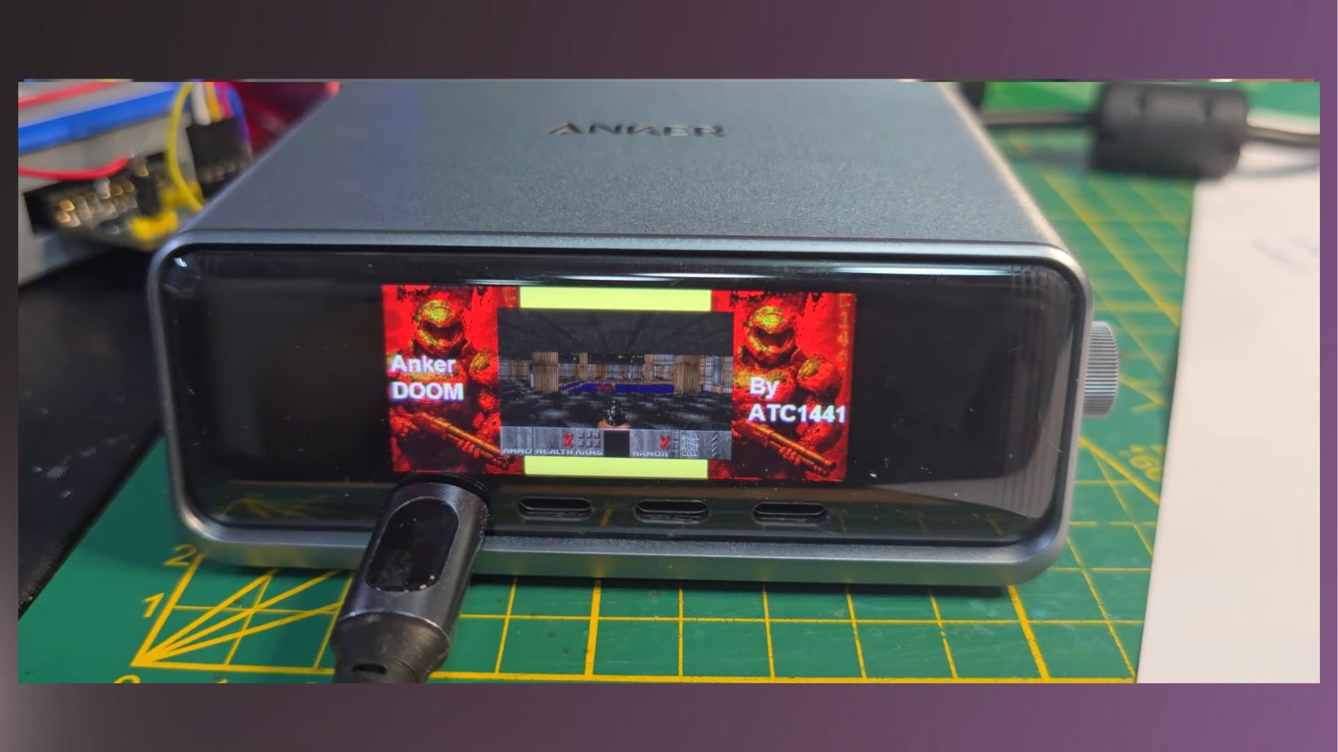 A screenshot from Aaron Christophel's video showing off Doom running on an Anker Prime charging station