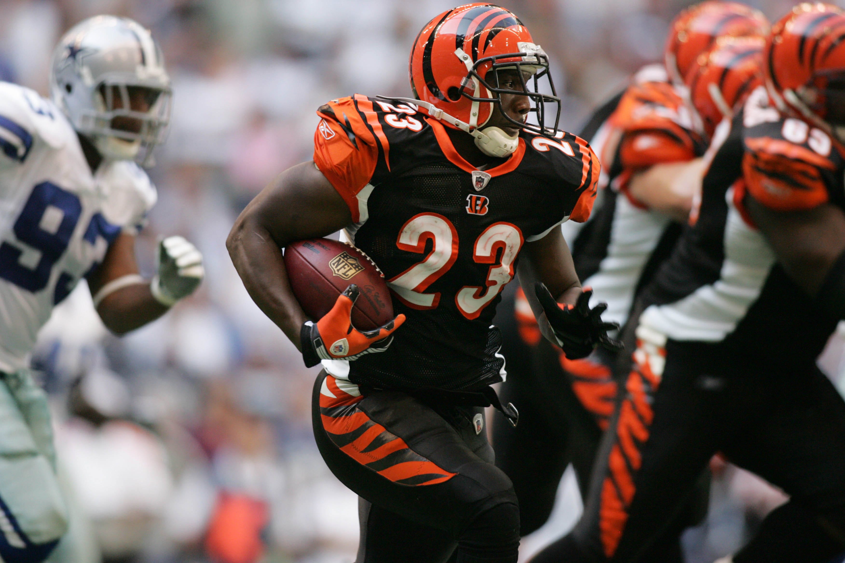 Cincinnati Bengals running back Chris Perry carries the ball against the Dallas Cowboys.
