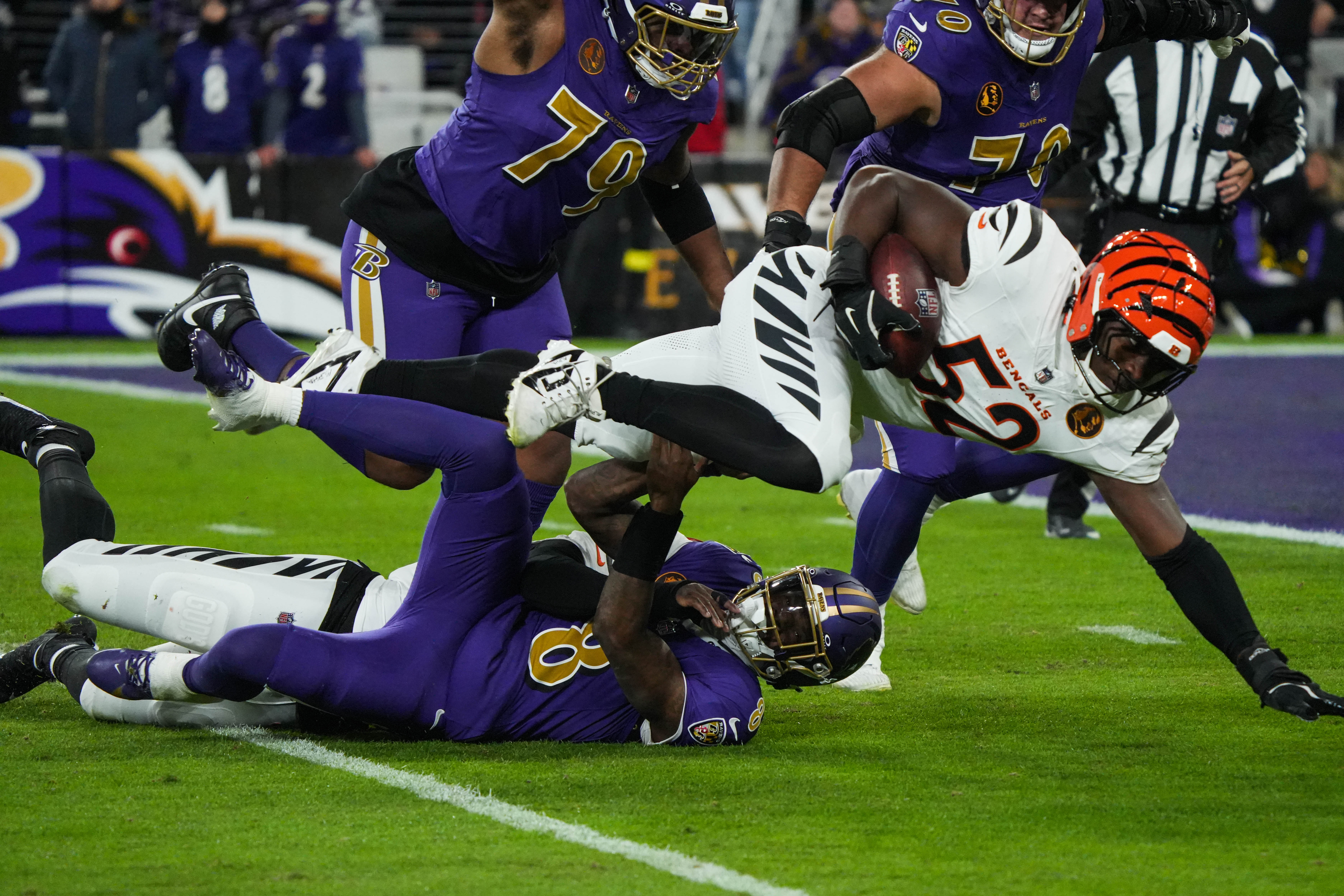 Linebacker Cedric Johnson comes down with a fumble by Baltimore quarterback Lamar Jackson during the Bengals' 32-14 victory over the Ravens. It was one of five turnovers the Bengals forced.