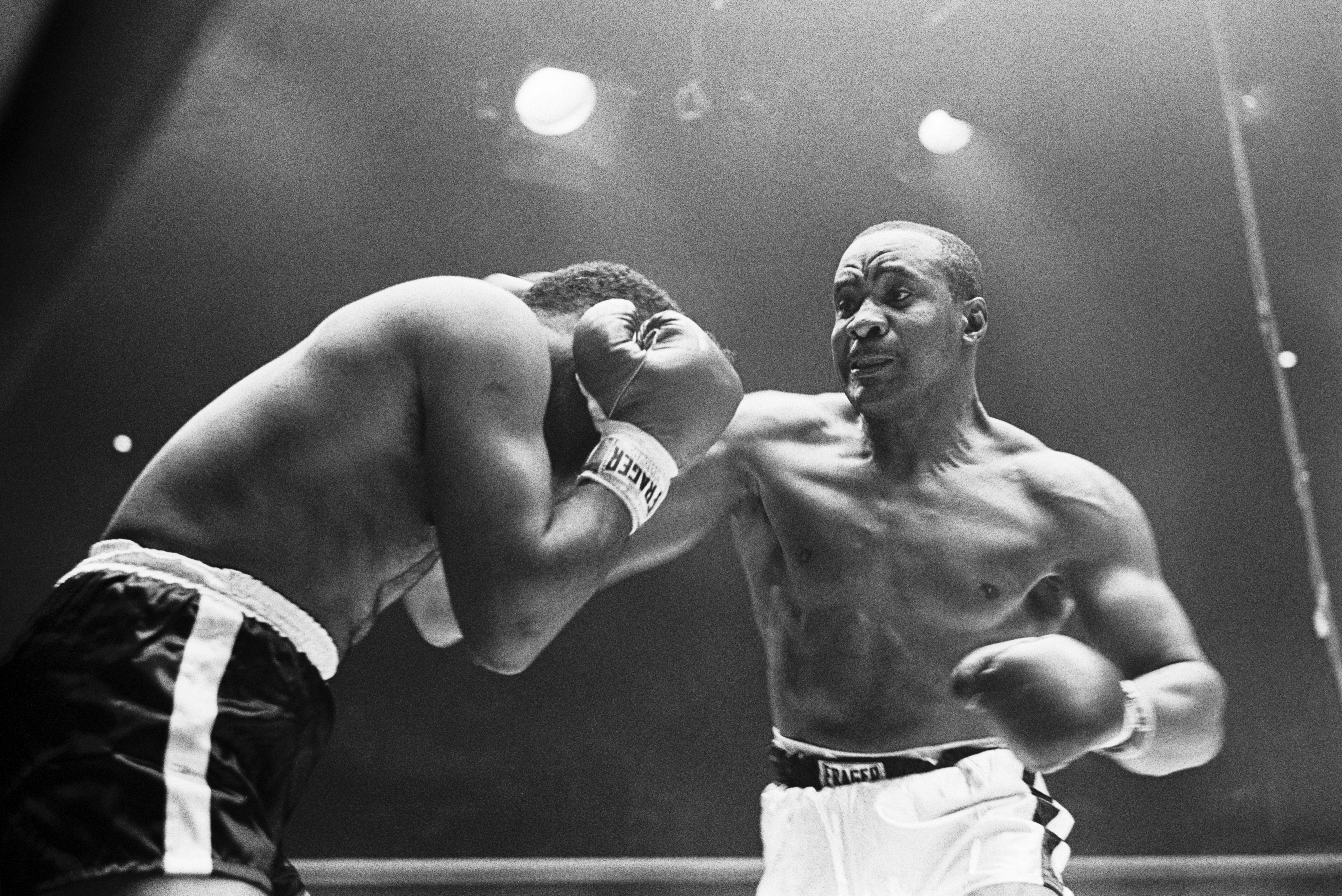 LAS VEGAS, NV - JULY 22: Photo shows 1st round action as Floyd Patterson (L) prepares to be met by a combination of punches from Sonny Liston during their Heavyweight Title bout on July 22, 1963 at the Convention Center in Las Vegas Nevada. Sonny Liston 215 lbs beat Floyd Patterson 194 lbs by KO at 2:10 in round 1 of 15 (Photo by Stanley Weston/Getty Images)