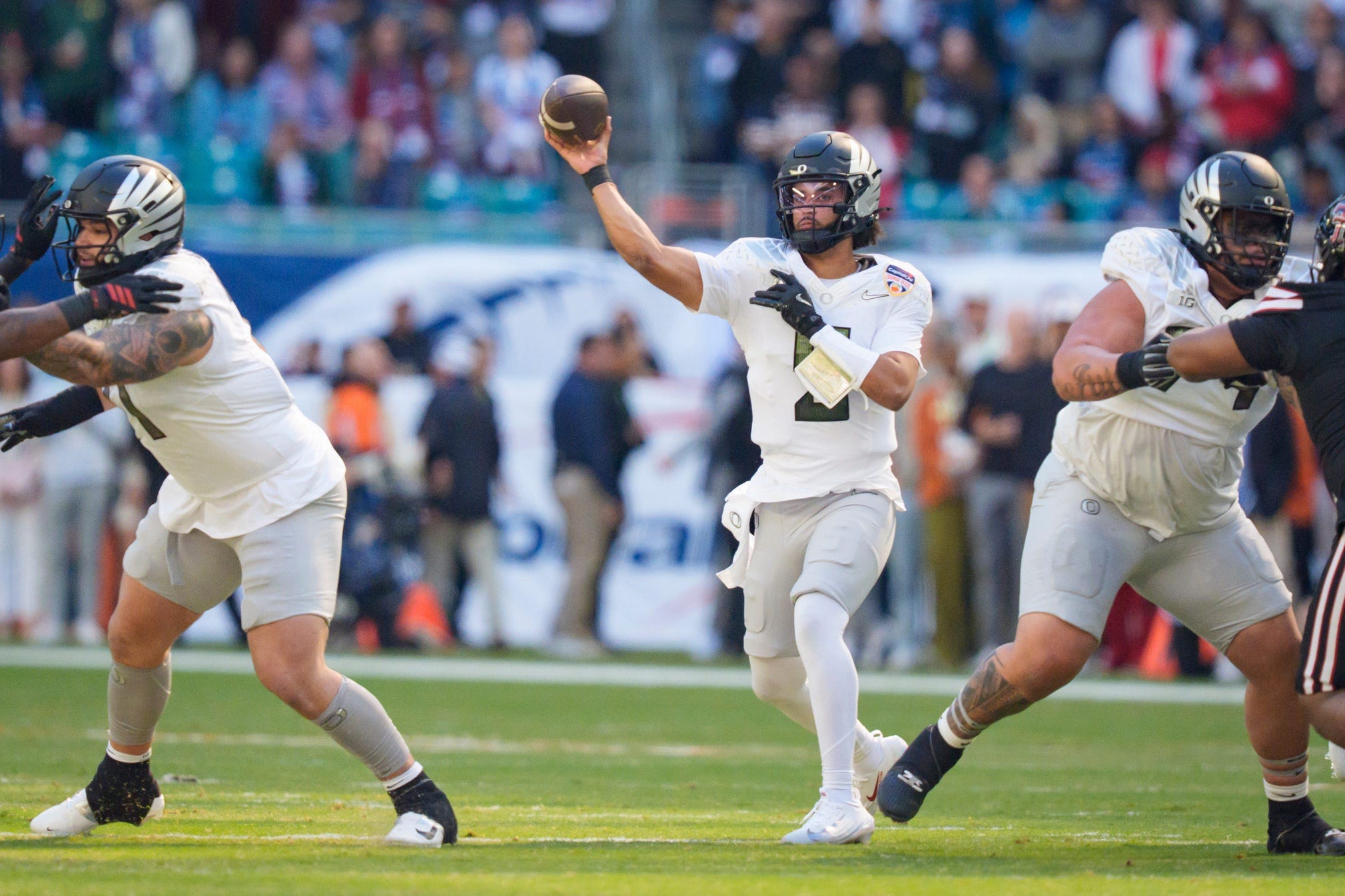 Oregon quarterback Dante Moore throws a pass as the Oregon Ducks take on the Texas Tech Red Raiders in the Orange Bowl on Jan. 1, 2026, at Hard Rock Stadium in Miami, Florida.