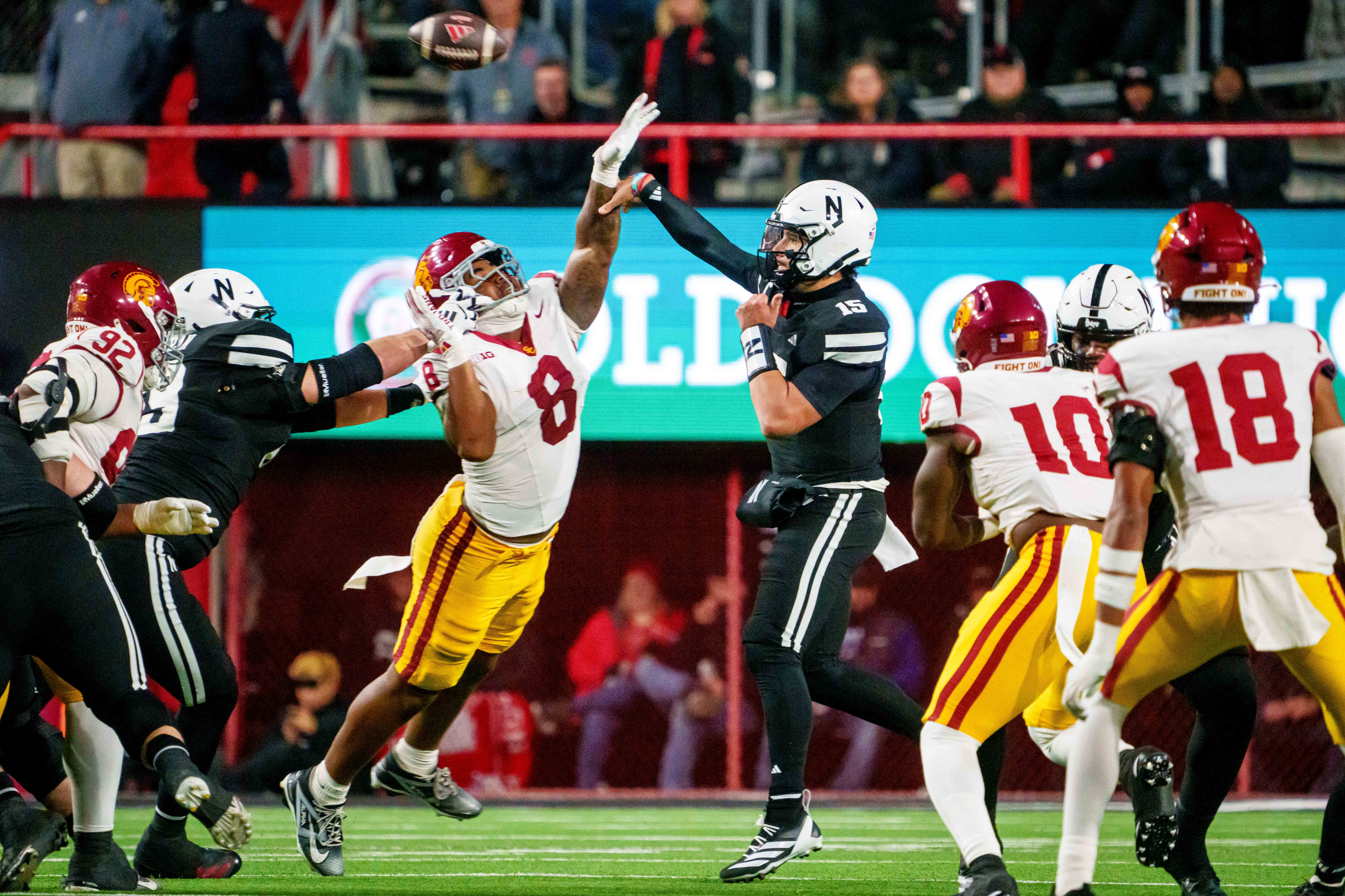 Nebraska Cornhuskers quarterback Dylan Raiola (15) passes against Southern California Trojans defensive tackle Devan Thompkins (8)