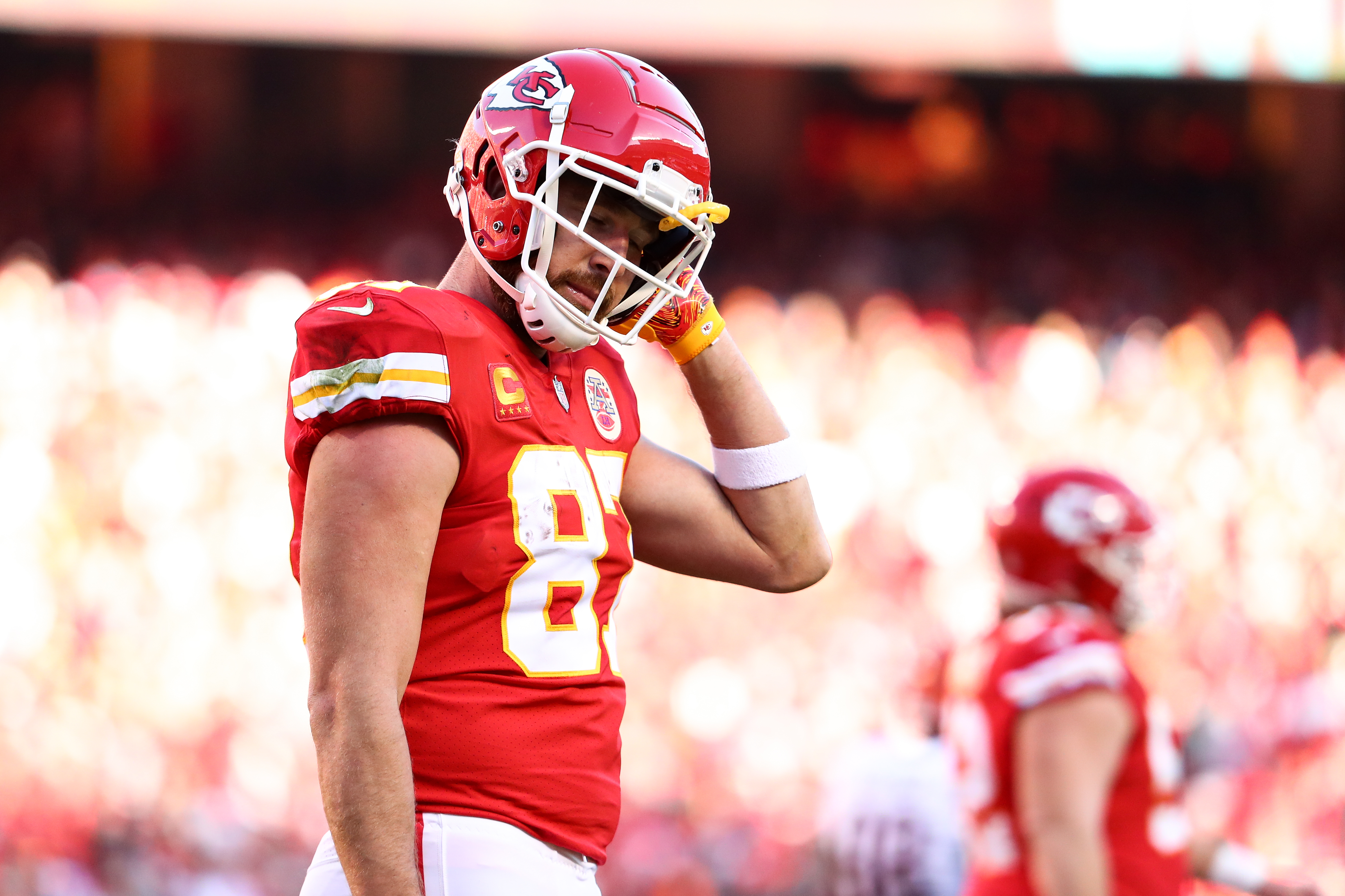 KANSAS CITY, MO - JANUARY 30: Travis Kelce #87 of the Kansas City Chiefs looks down dejected during the AFC Championship Game against the Cincinnati Bengals at GEHA Field at Arrowhead Stadium on January 30, 2022 in Kansas City, Missouri. (Photo by Kevin Sabitus/Getty Images)