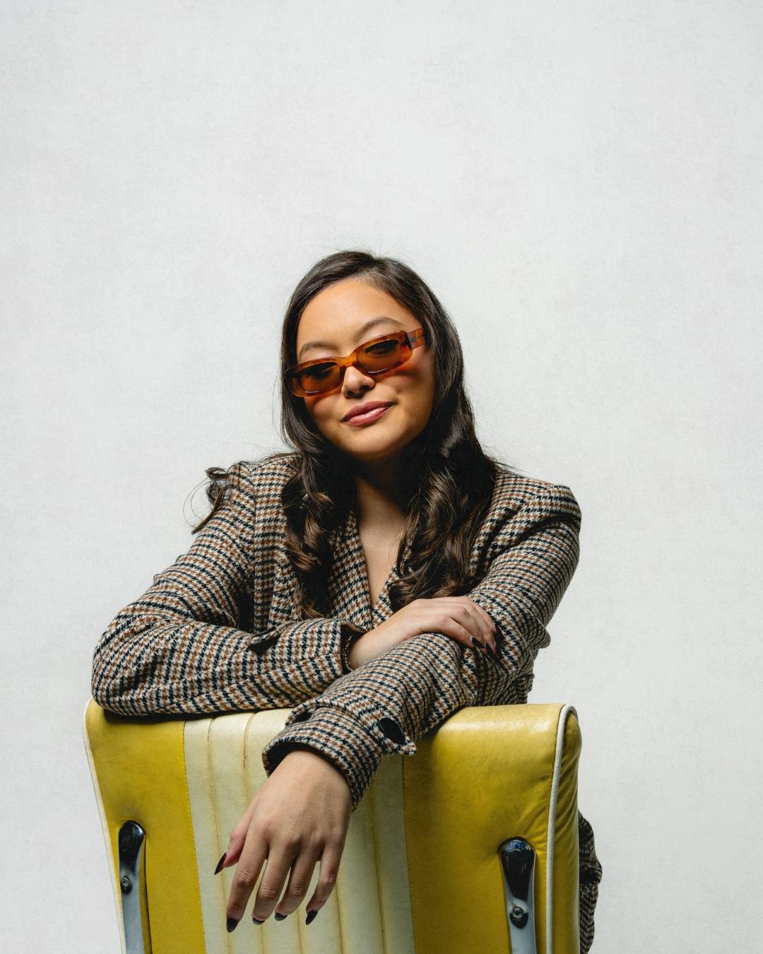 Kristi Cook sitting in chair