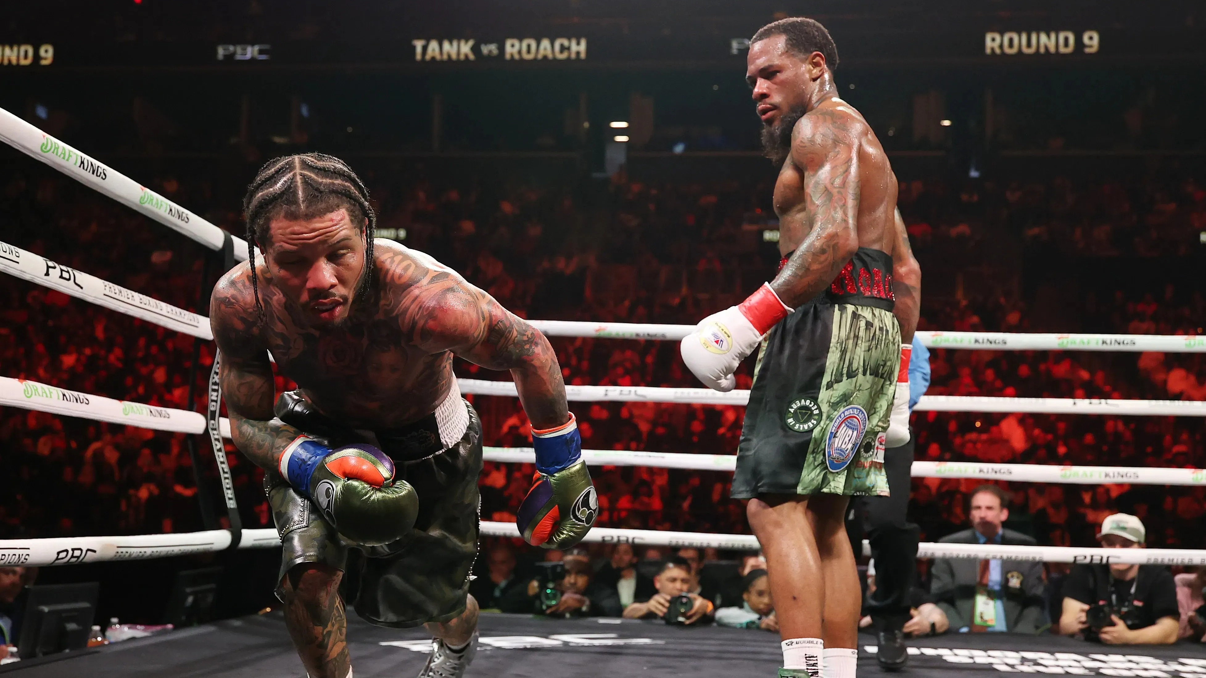 NEW YORK, NEW YORK - MARCH 01: Gervonta Davis takes a knee in the middle of round nine due to the grease in his braids dripped into his eyes against Lamont Roach Jr. during their bout for Davis' WBA lightweight title at Barclays Center on March 01, 2025 in New York City. (Photo by Al Bello/Getty Images)