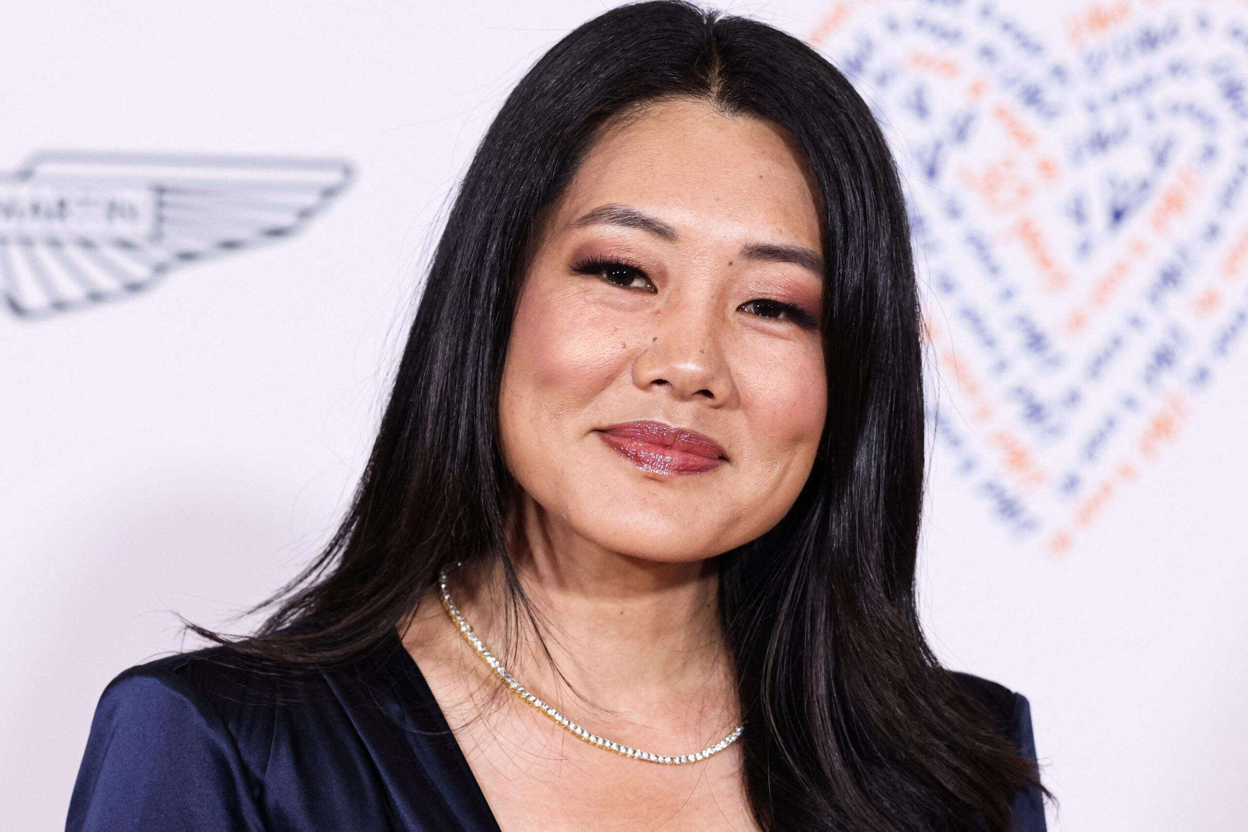 Crystal Kung Minkoff posing on the red carpet. 