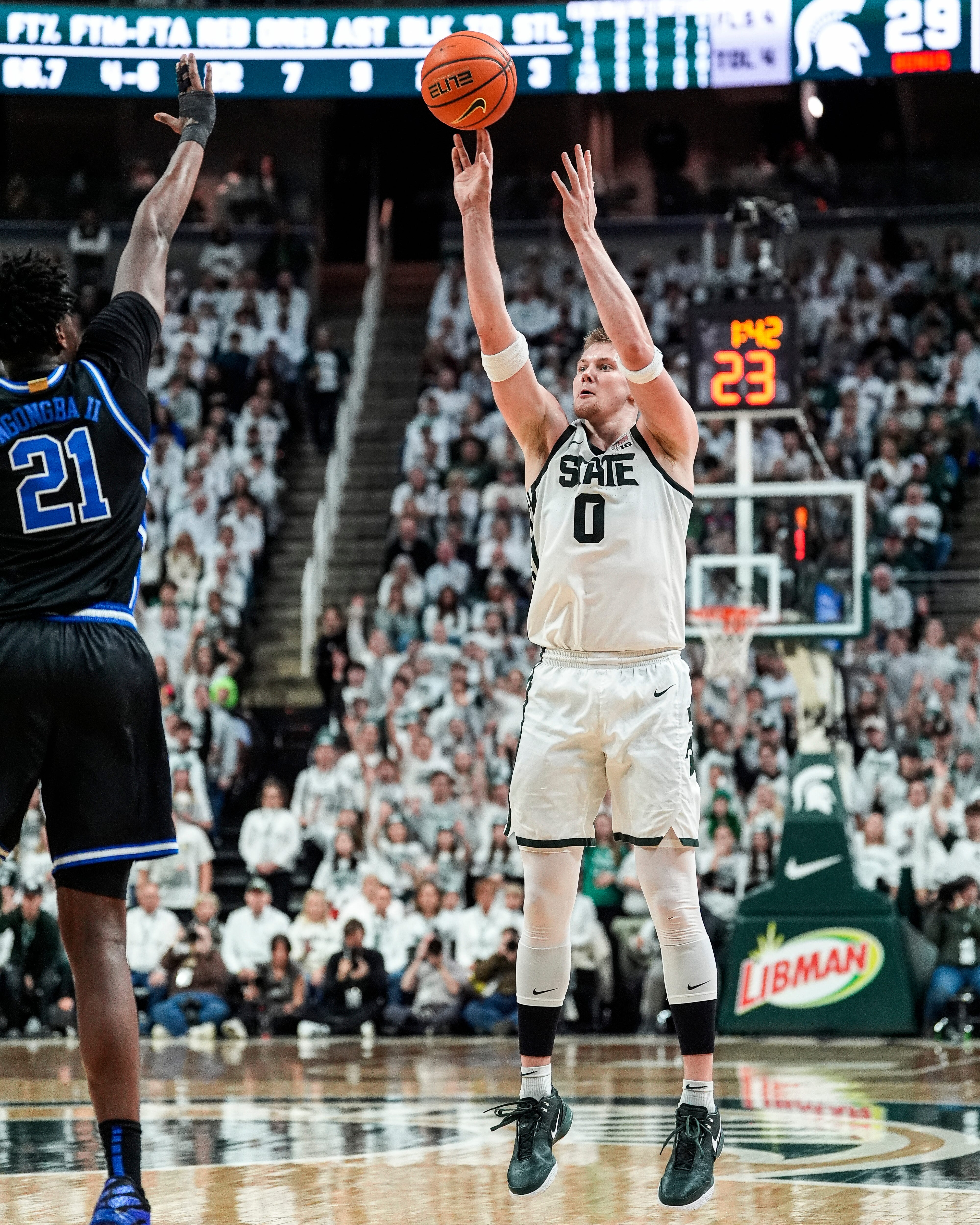 Michigan State forward Jaxon Kohler (0) attempts a 3-pointer against Duke during the first half at Breslin Center in East Lansing on Saturday, Dec. 6, 2025.