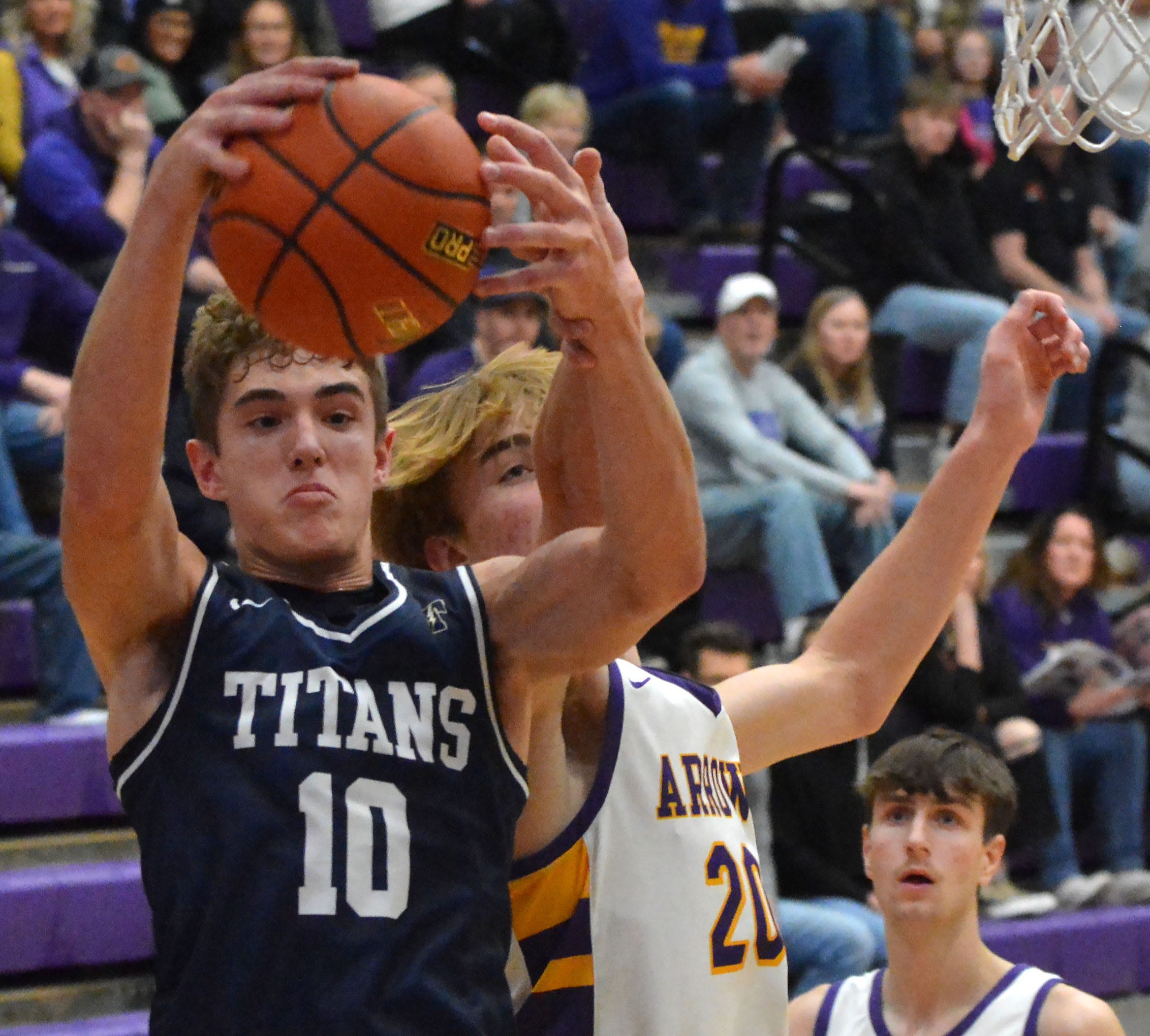 Tea Area's Mitch Grant grabs a rebound against Watertown's Isaac Rehorst during their Eastern South Dakota Conference boys basketball game on Saturday, Dec. 20, 2025, in the Watertown Civic Arena. Tea Area won 65-61. Both teams received votes in the latest South Dakota Prep Media Basketball Poll released on Monday, Dec. 22.