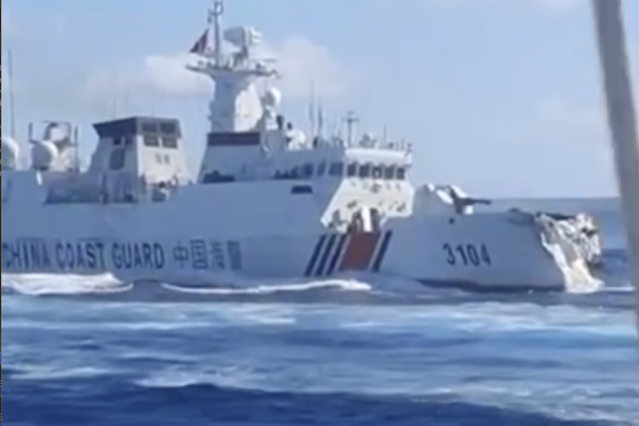 In this photo, taken from video and provided by the Philippine Coast Guard, a damaged Chinese Coast Guard ship is seen after accidentally colliding with a Chinese Navy vessel while chasing a Philippine fisheries boat near Scarborough Shoal in the disputed South China Sea on Monday Aug. 11, 2025. (Philippine Coast Guard via AP)