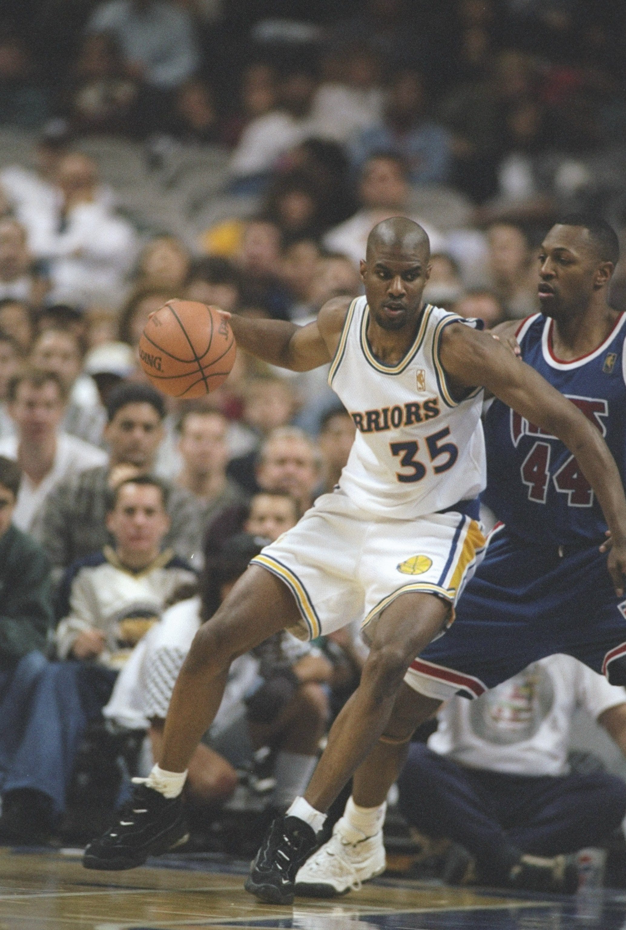 28 Nov 1996: Ray Owes of the Golden State Warriors tries to fend off Tony Massenburg of the New Jersey Nets at the San Jose Arena in San Jose, California. The Warriors won the game 124-118.